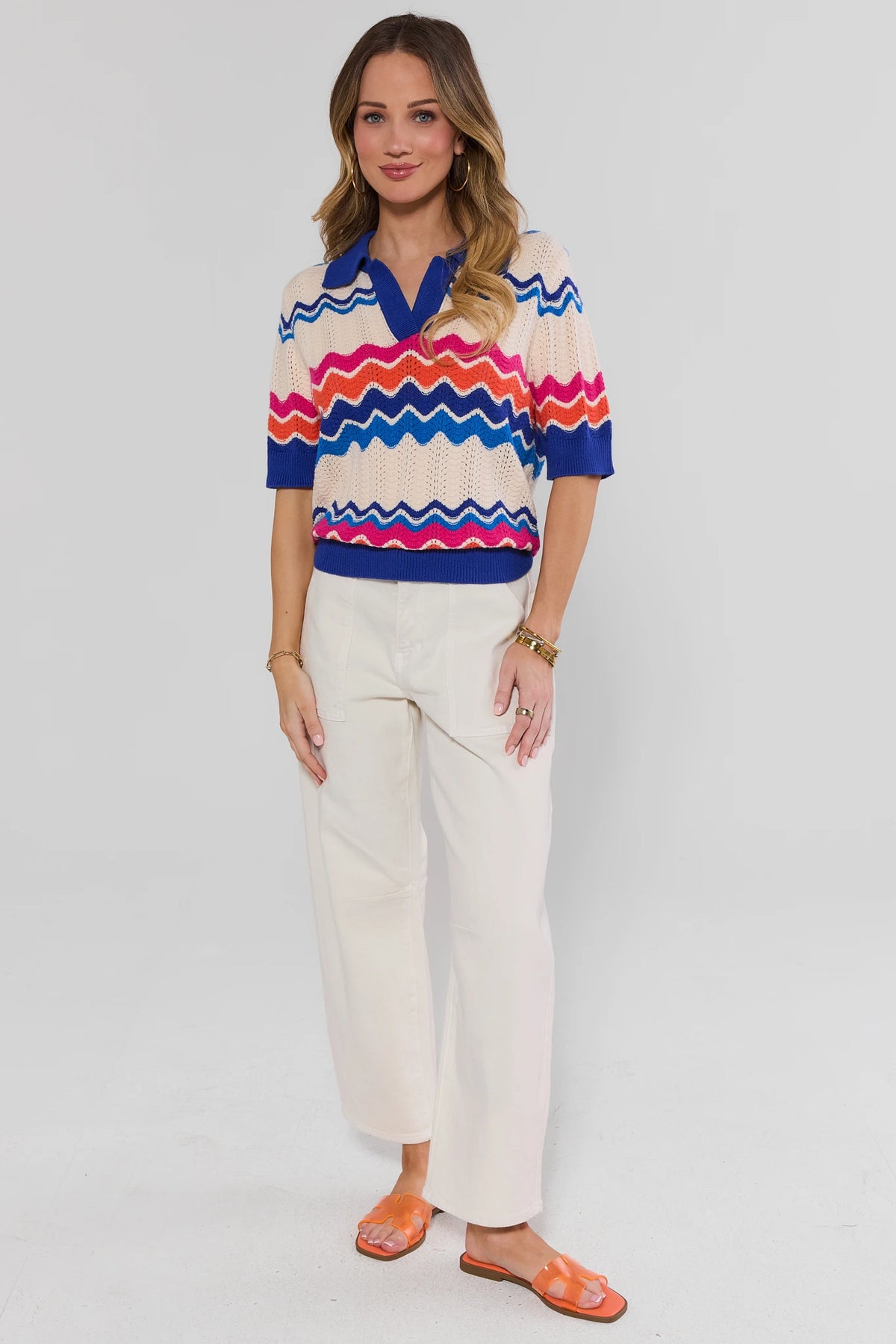 Betsy Knit Top by THML - multicolor wave stripe knit top styled with cream wide-leg pants, full-length front view | Avara