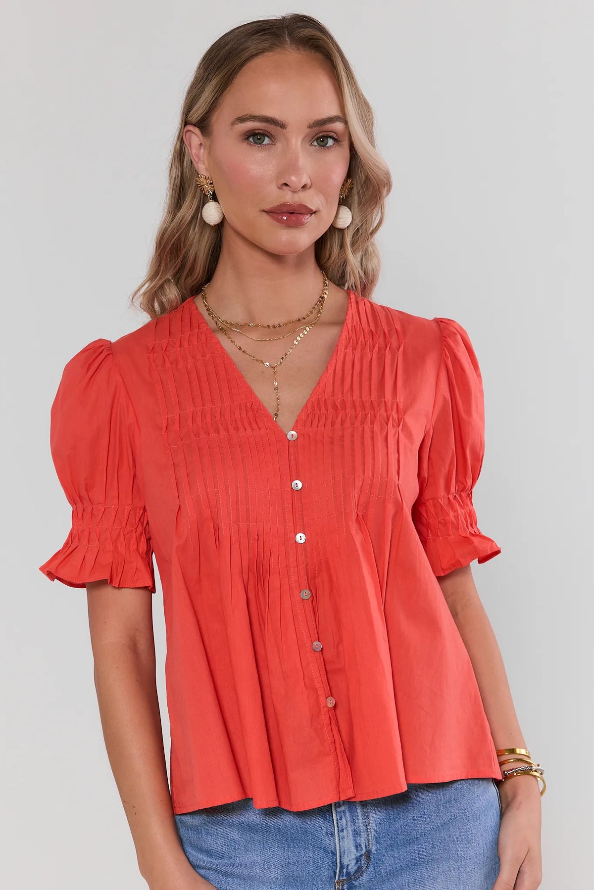 Orange Pleated Short Sleeve Top with V-neck & button front - Front View | Avara