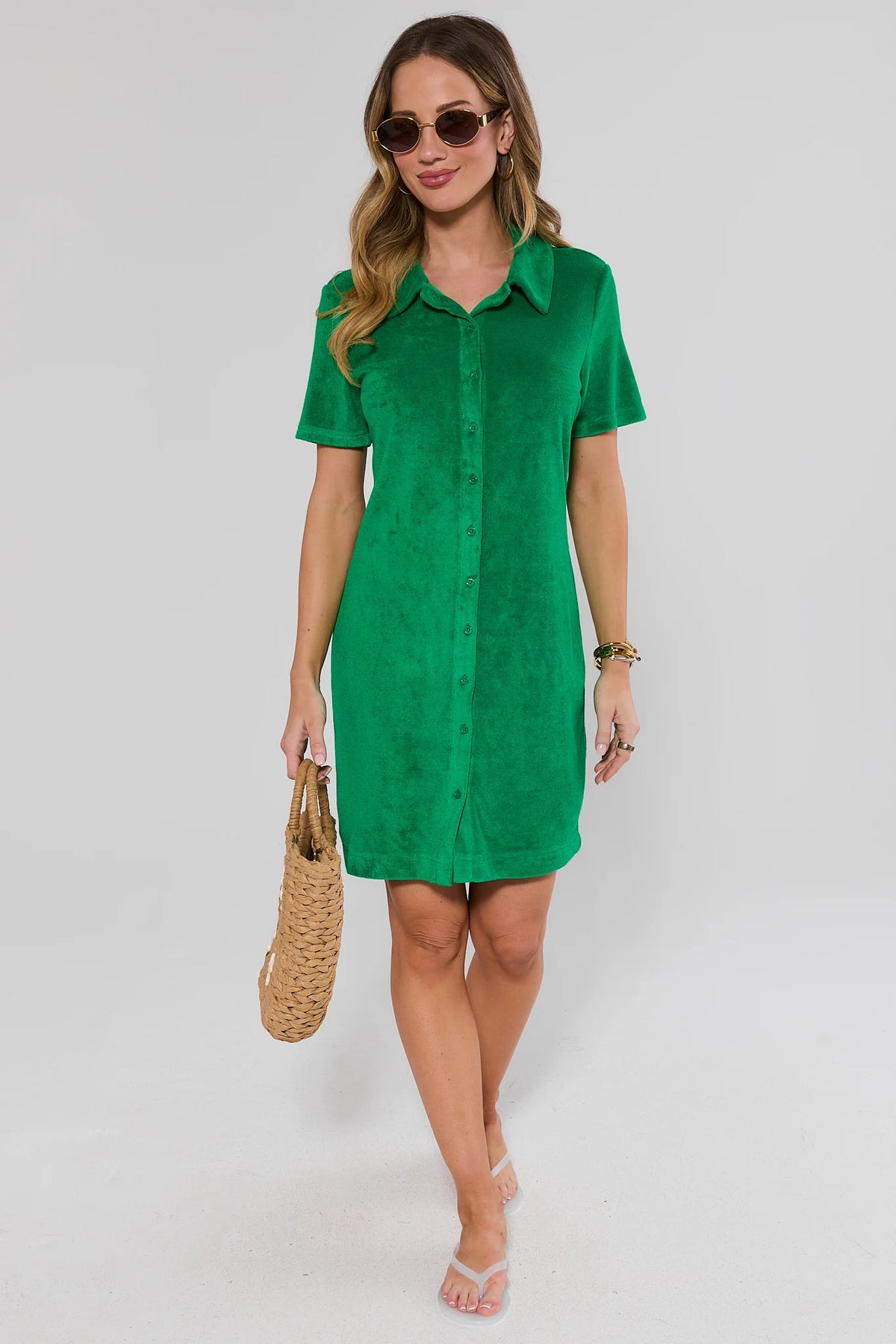 Woman wearing green terry cloth dress with woven bag and slides - Full Length View | Avara