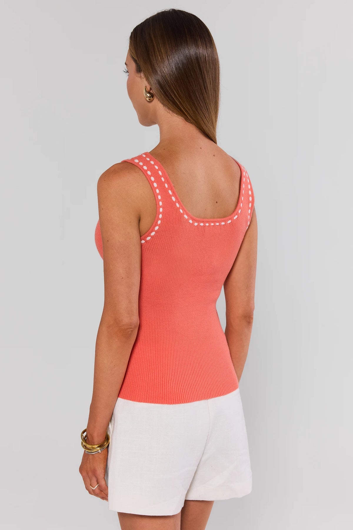Coral orange ribbed knit tank top with white stitched trim straps and scoop back - Back View | Avara