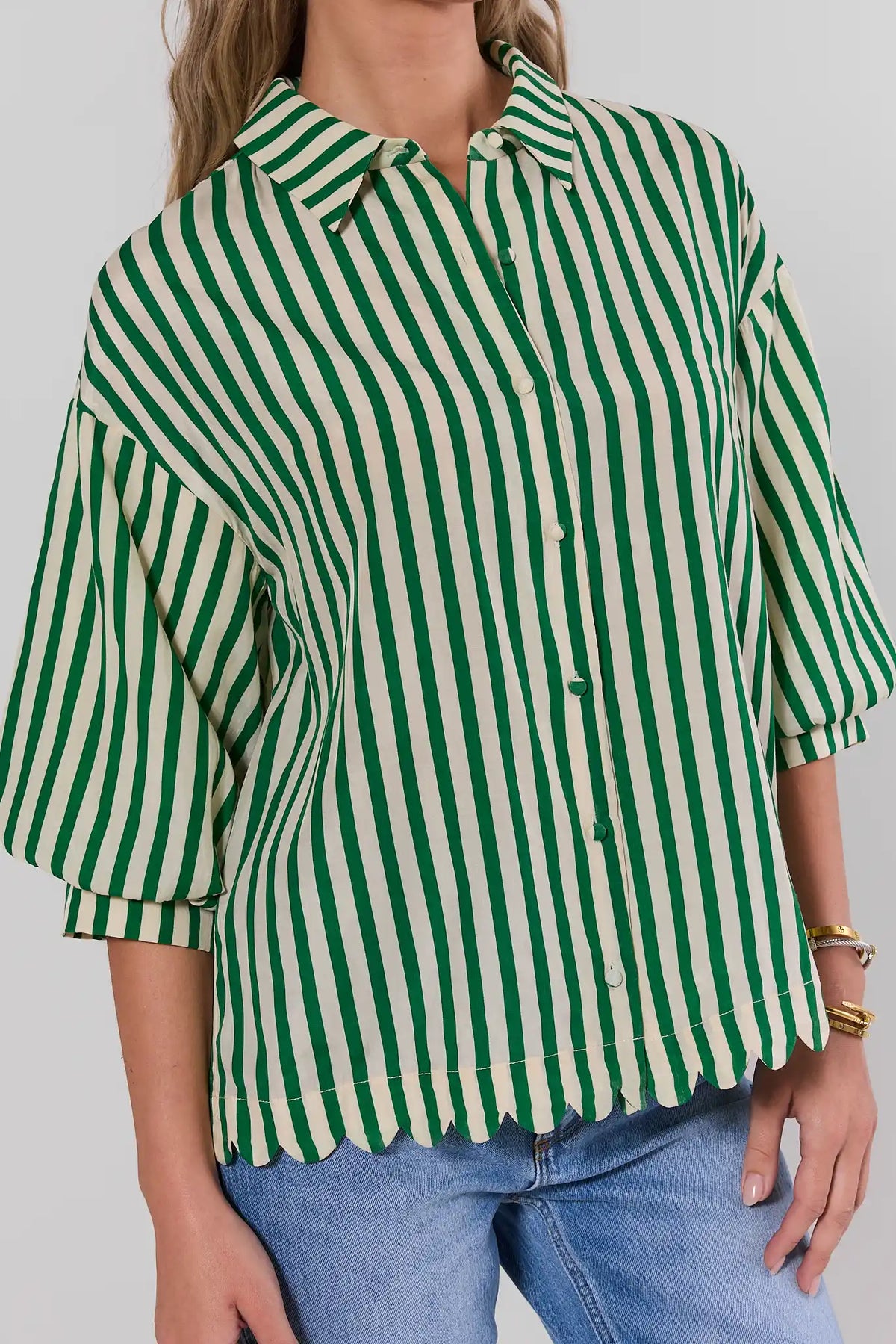 Green striped button-up top with scalloped hem and 3/4 sleeves close-up - Front Detail | Avara