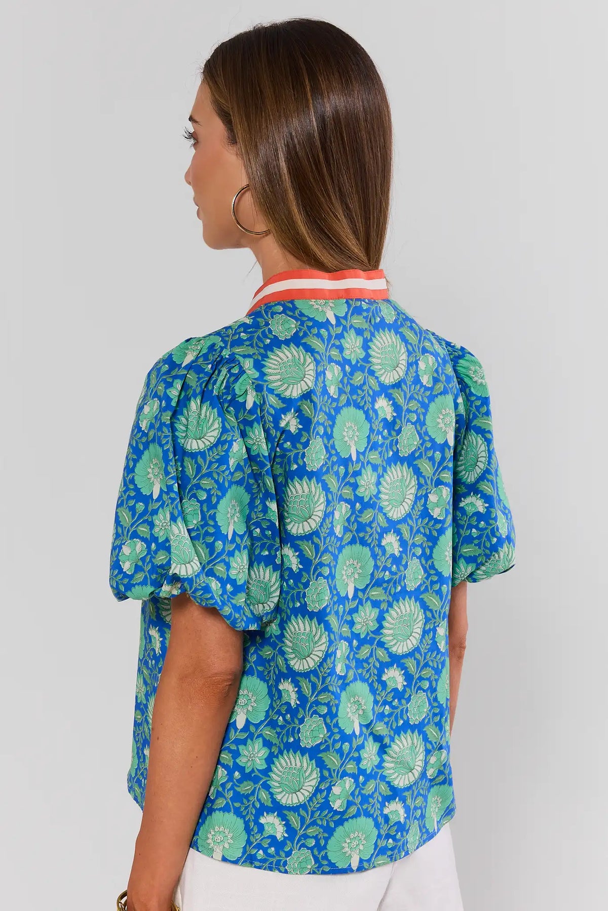 Blue floral printed contrast trim top back view with puff sleeves on model - THML | Avara
