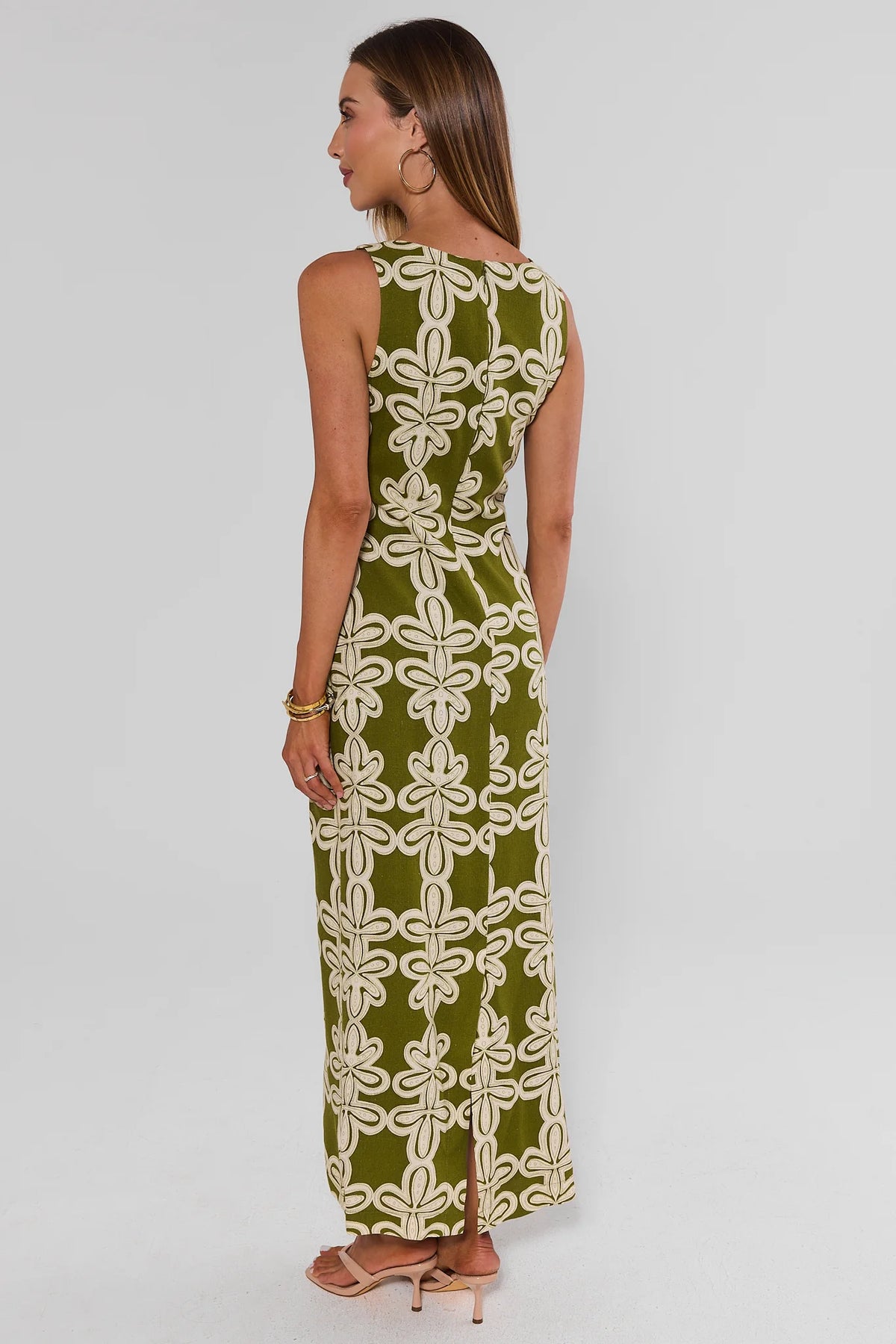Daria Green Printed Maxi Dress - Back View Showing Abstract Floral Print, Hem Slit & Flowy Silhouette | Avara