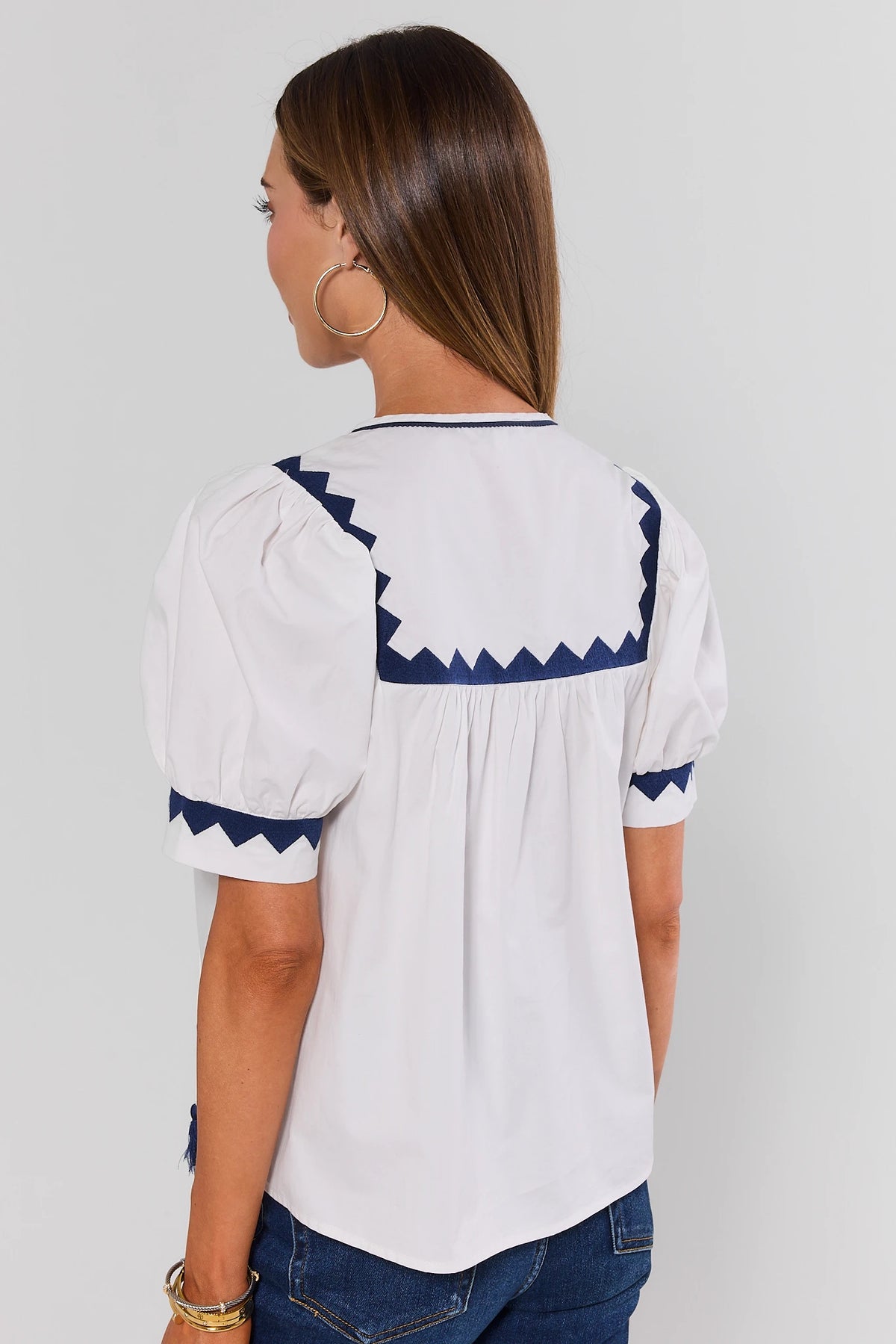 White Embroidered Trim Puff Sleeve Top back view showing navy zigzag yoke and gathered detail | Avara