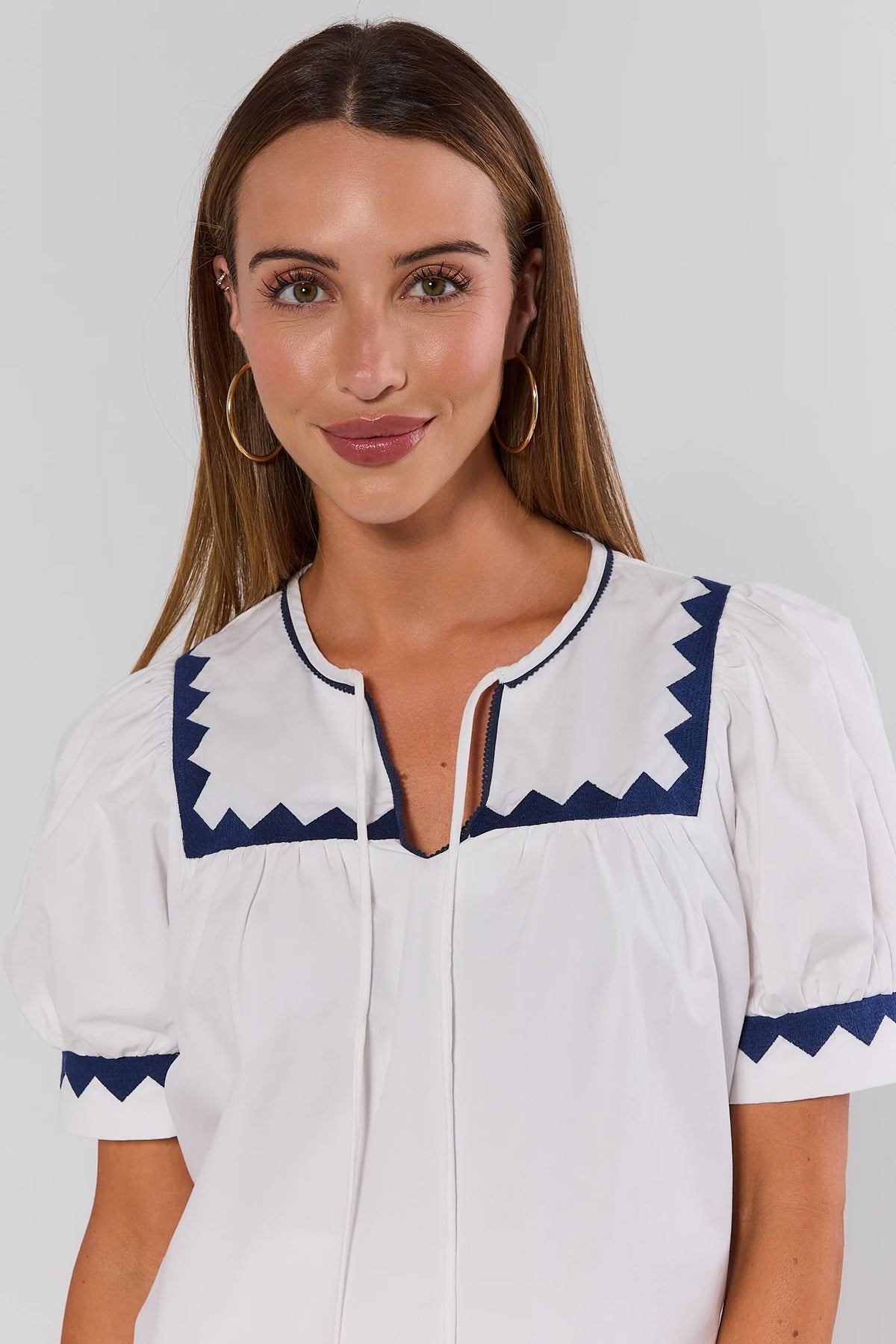 White Embroidered Trim Puff Sleeve Top close-up neckline and navy zigzag trim detail | Avara