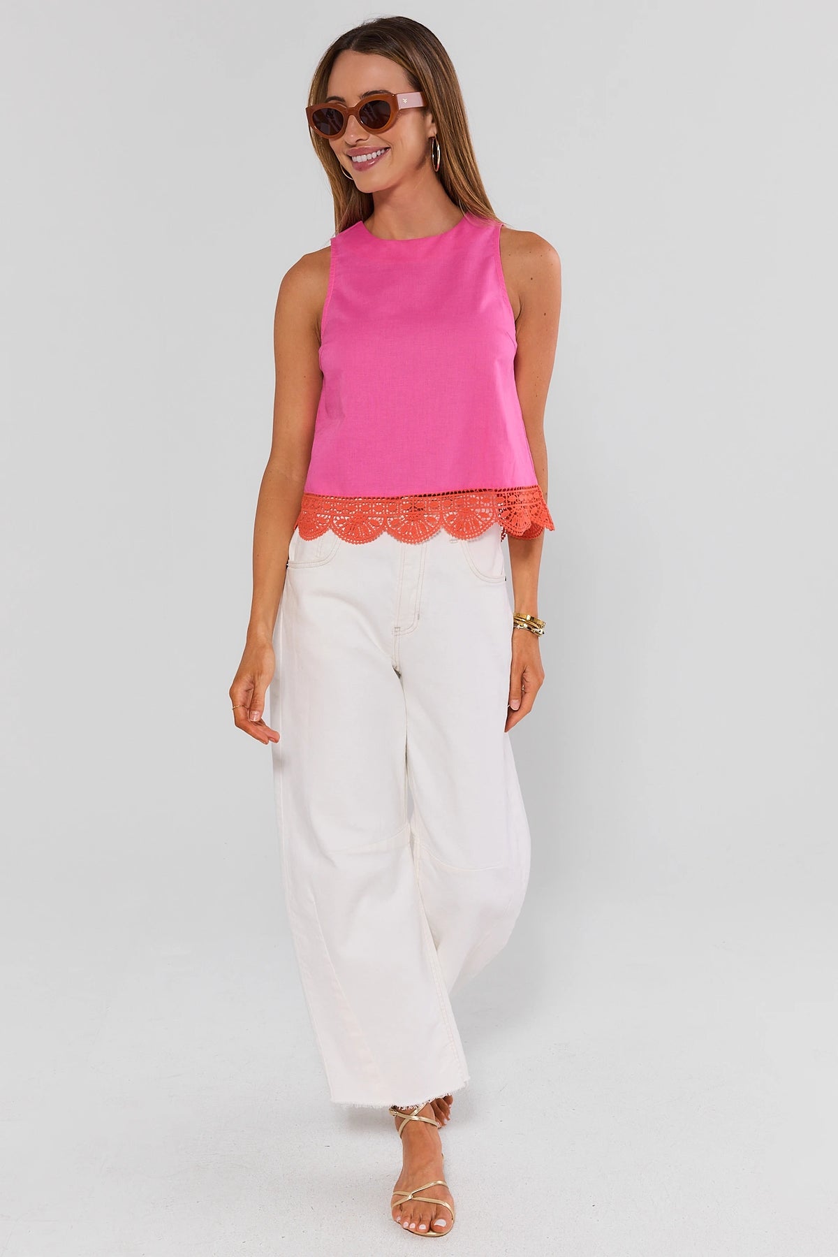 Pink Eyelet Trim Tank Top full-length front view with white wide-leg jeans and sunglasses | Avara