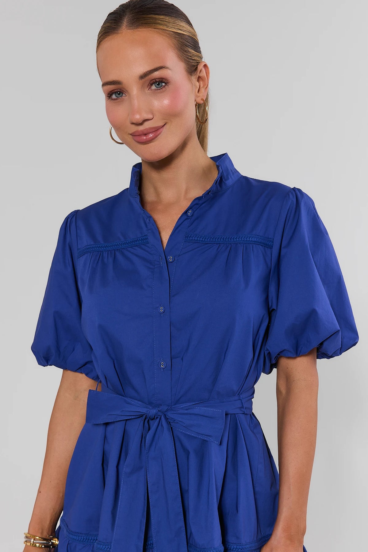 Jane Navy Puff Sleeve Short Dress braided trim and button front close-up detail | Avara