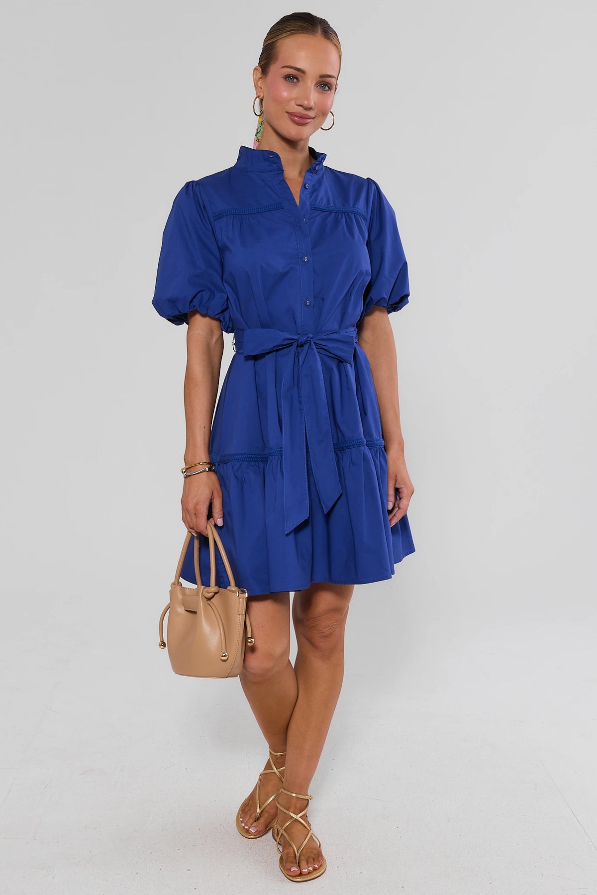 Jane Navy Puff Sleeve Short Dress styled with tan bag and gold sandals - Full Length | Avara