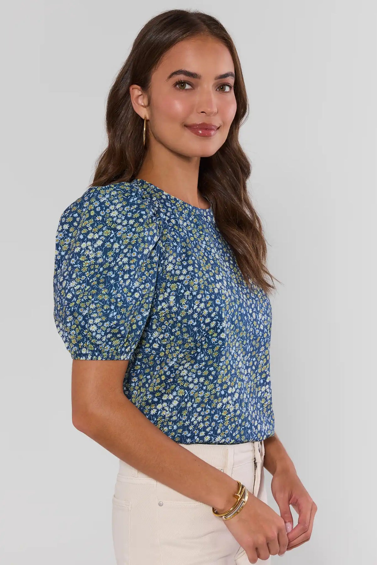 Victoria Navy Floral Print Top side profile with puff sleeves and white denim, cute top for women | Avara