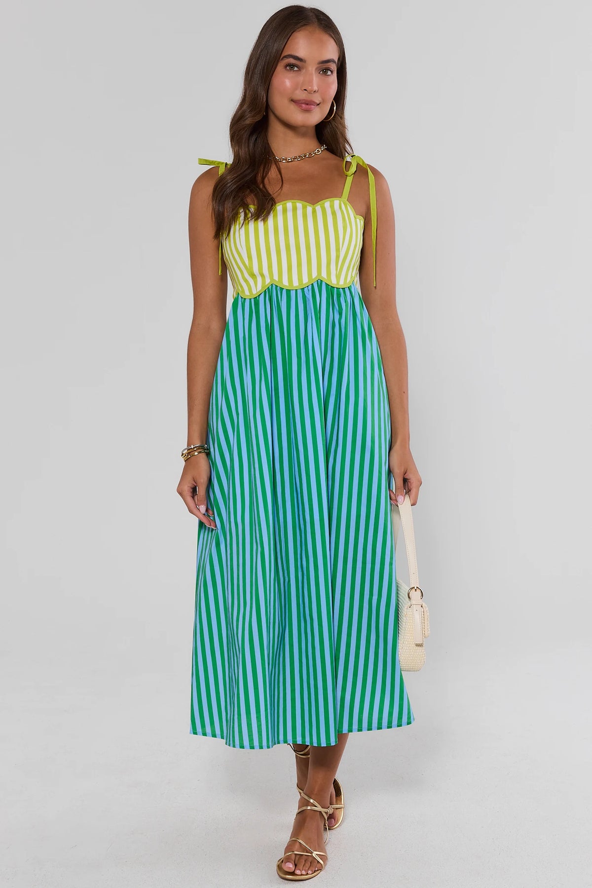 Green Contrast Stripe Maxi Dress full length on model with gold sandals - Front View | Avara
