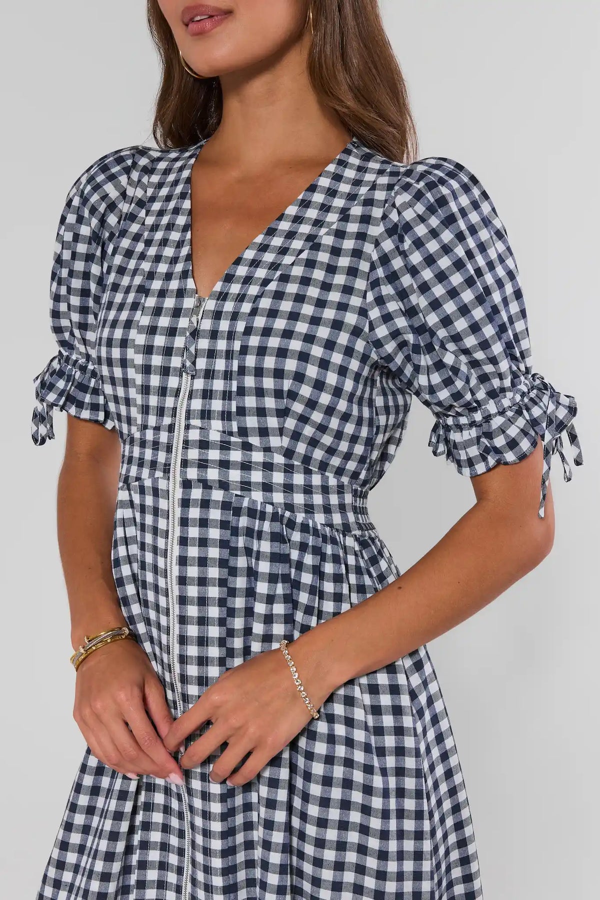 Emersyn Navy Gingham Dress puff sleeve and zip bodice close-up detail - Upper Body View | Avara