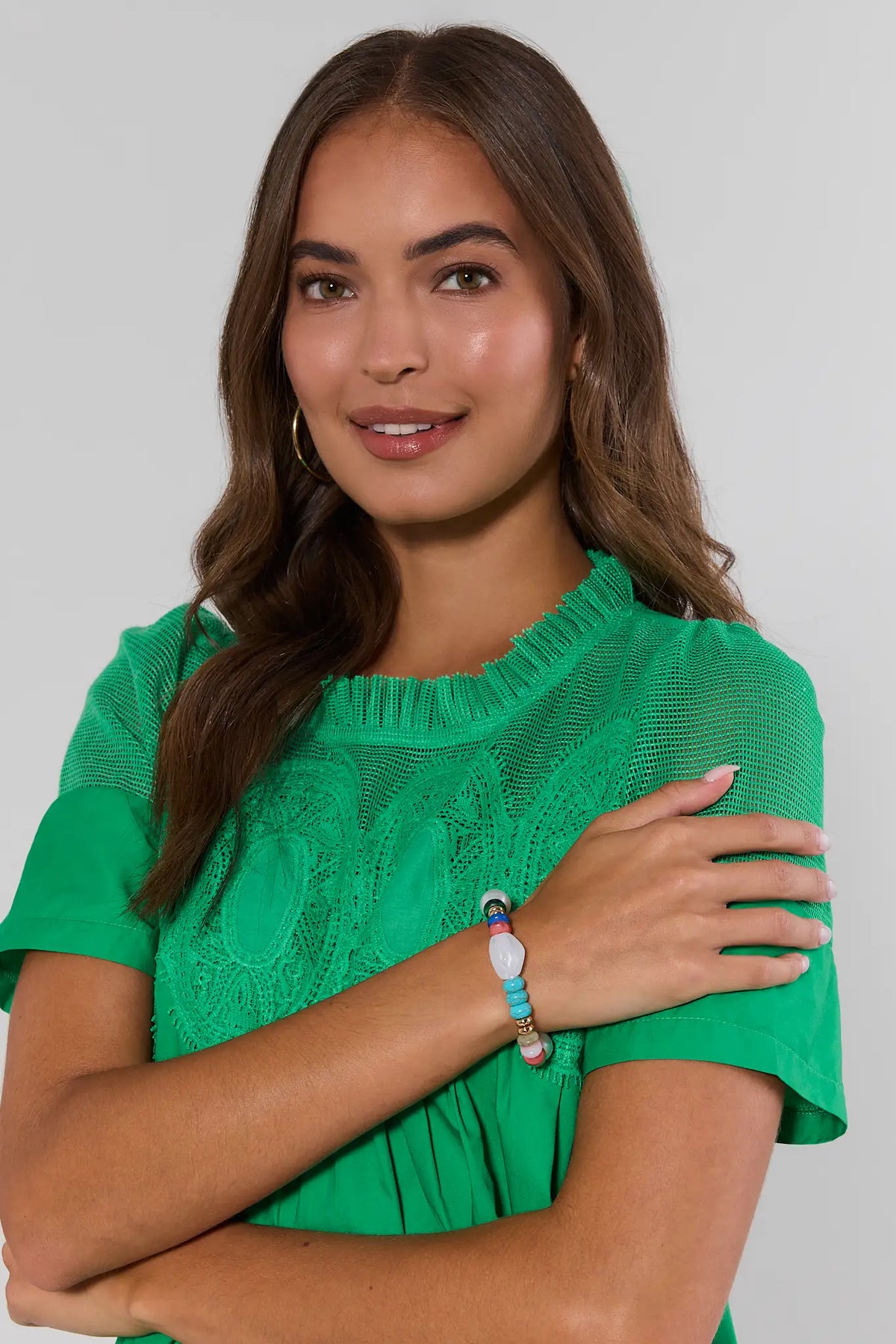 Woman in green lace top wearing multicolored beaded bracelet with mixed stone accents - On Model | Avara