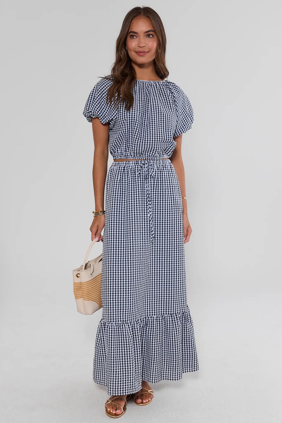 Navy Gingham Bubble Hem Top styled with matching maxi skirt and woven tote - Full Length | Avara