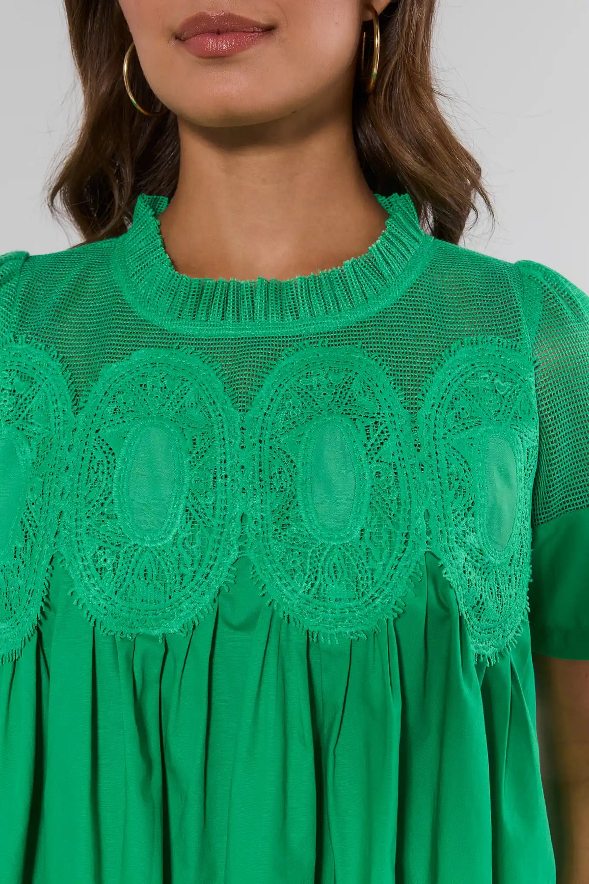 Gabrielle Green Peplum Top embroidered neckline and mesh detail - Closer Neckline Detail | Avara