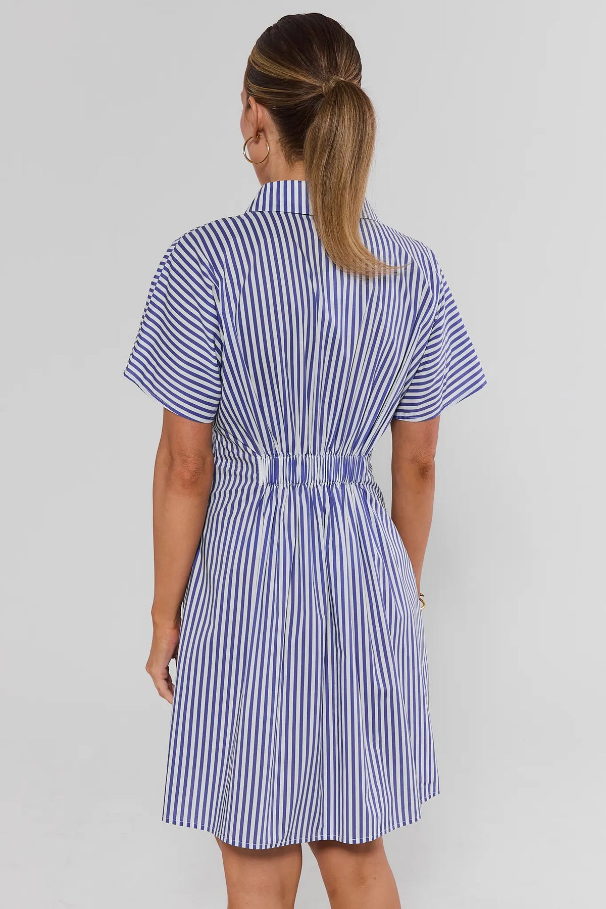 Olivia Blue Striped Button Up Short Dress - Back View showing elastic waist and flowy skirt | Avara