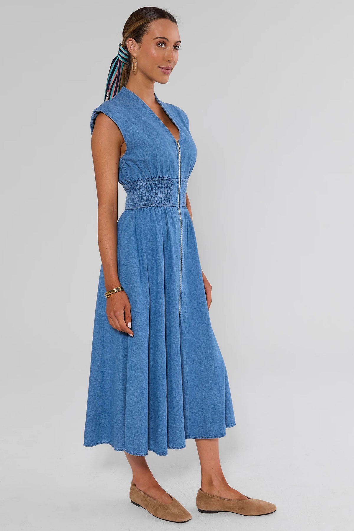 Collins Medium Wash Zip Up Midi Dress - side profile showing A-line midi skirt and smocked waist | Avara