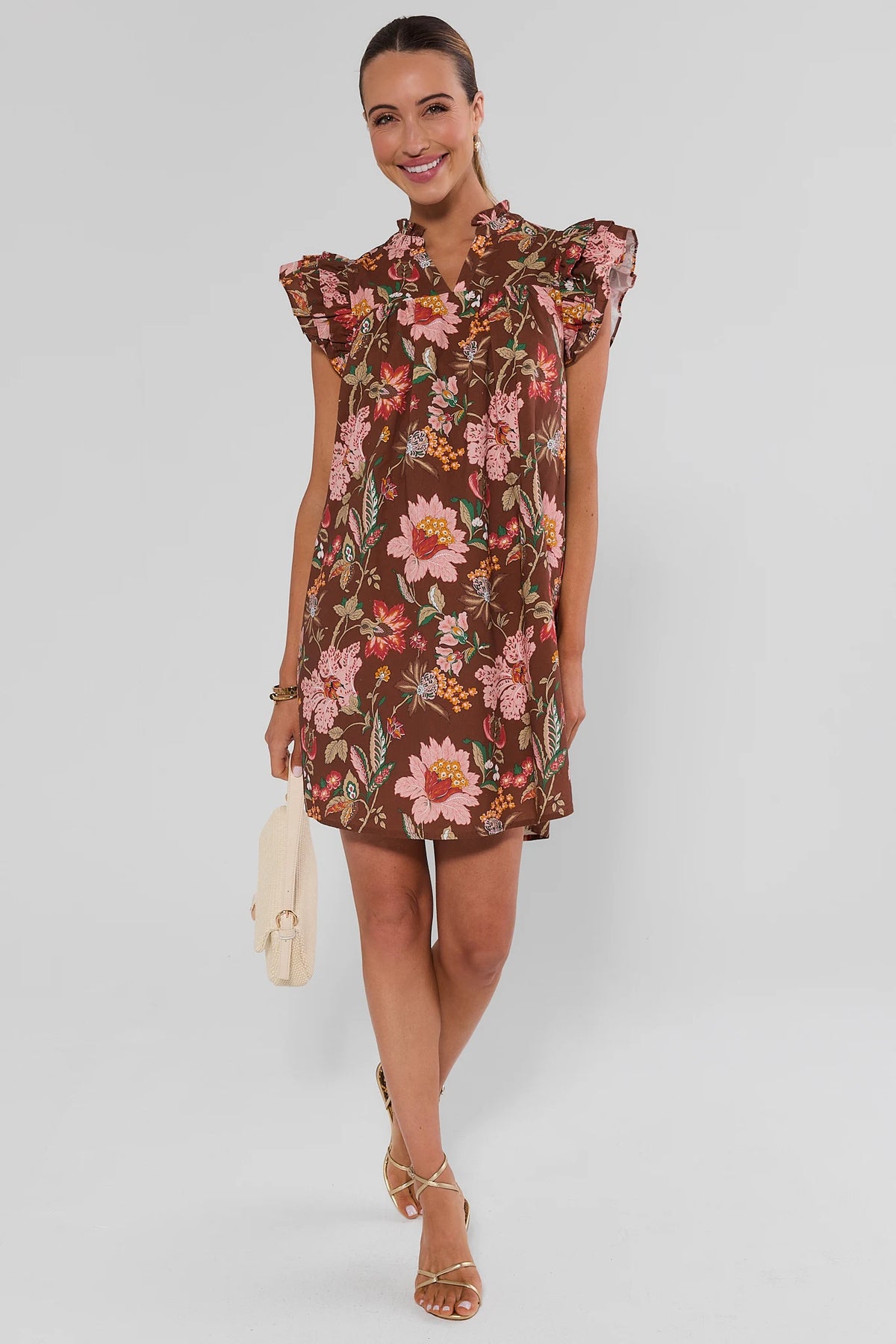 Romy Brown Floral Print Dress full-length front view styled with gold sandals and cream bag | Avara