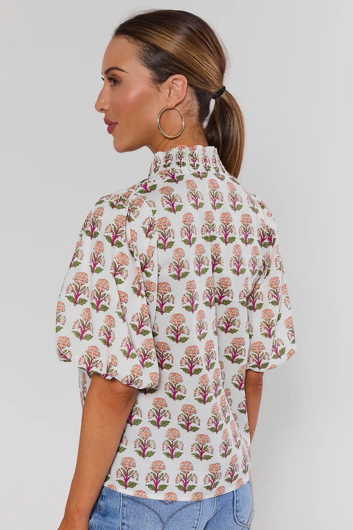 White Floral Printed Top by THML with allover pink-green block print and smocked neckline - Back View On Model | Avara