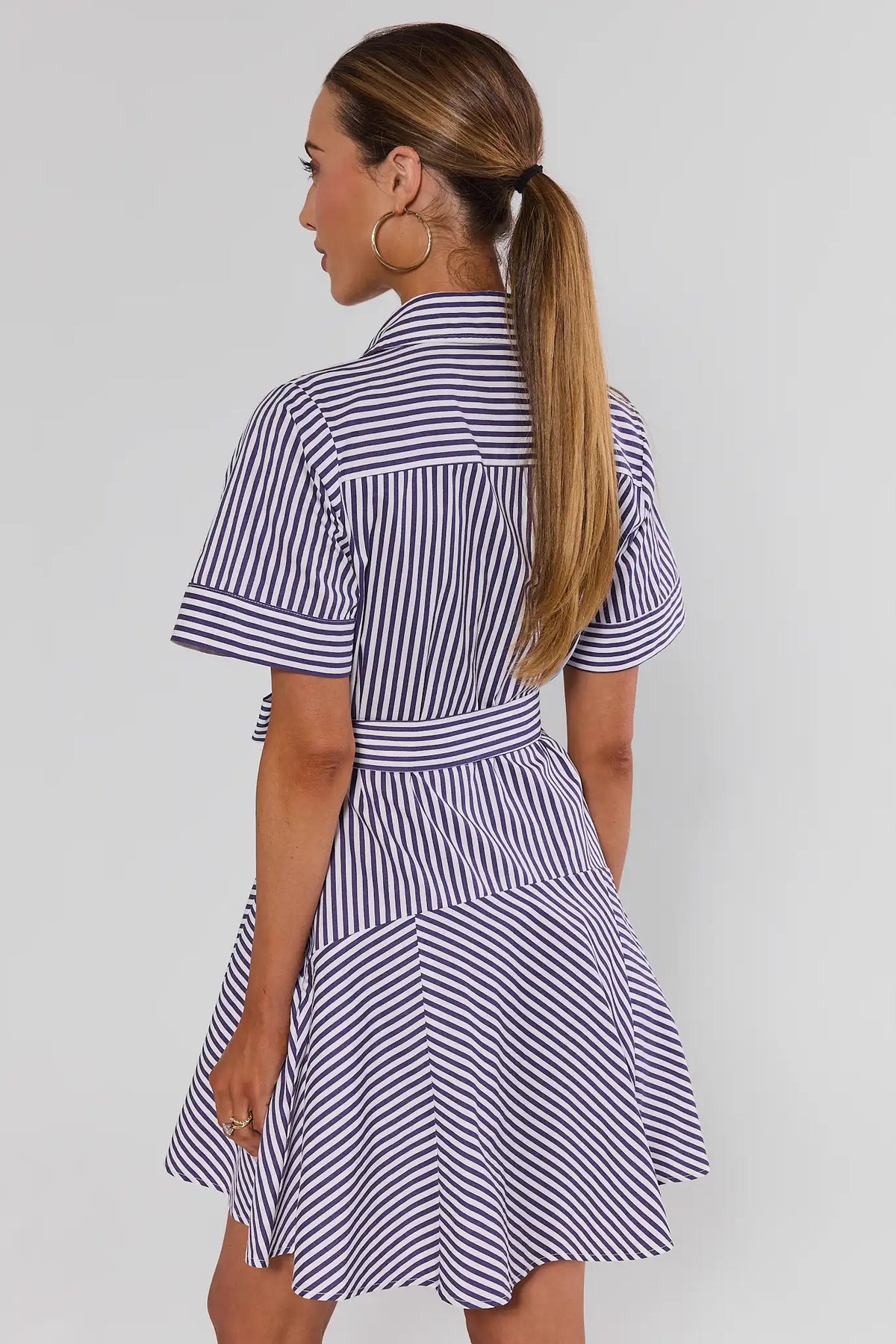 Millie Purple Striped Short Dress - Back View, short-sleeve shirt dress with mixed stripe skirt and tie waist | Avara