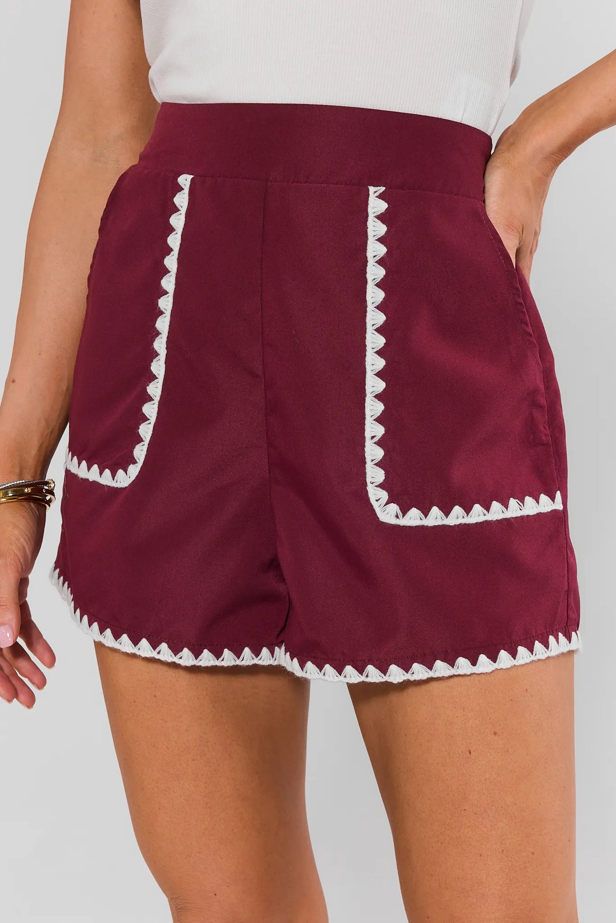 Maroon Embroidered Trim Shorts with white scallop trim, high-waist, patch pockets - Front View on Model | Avara
