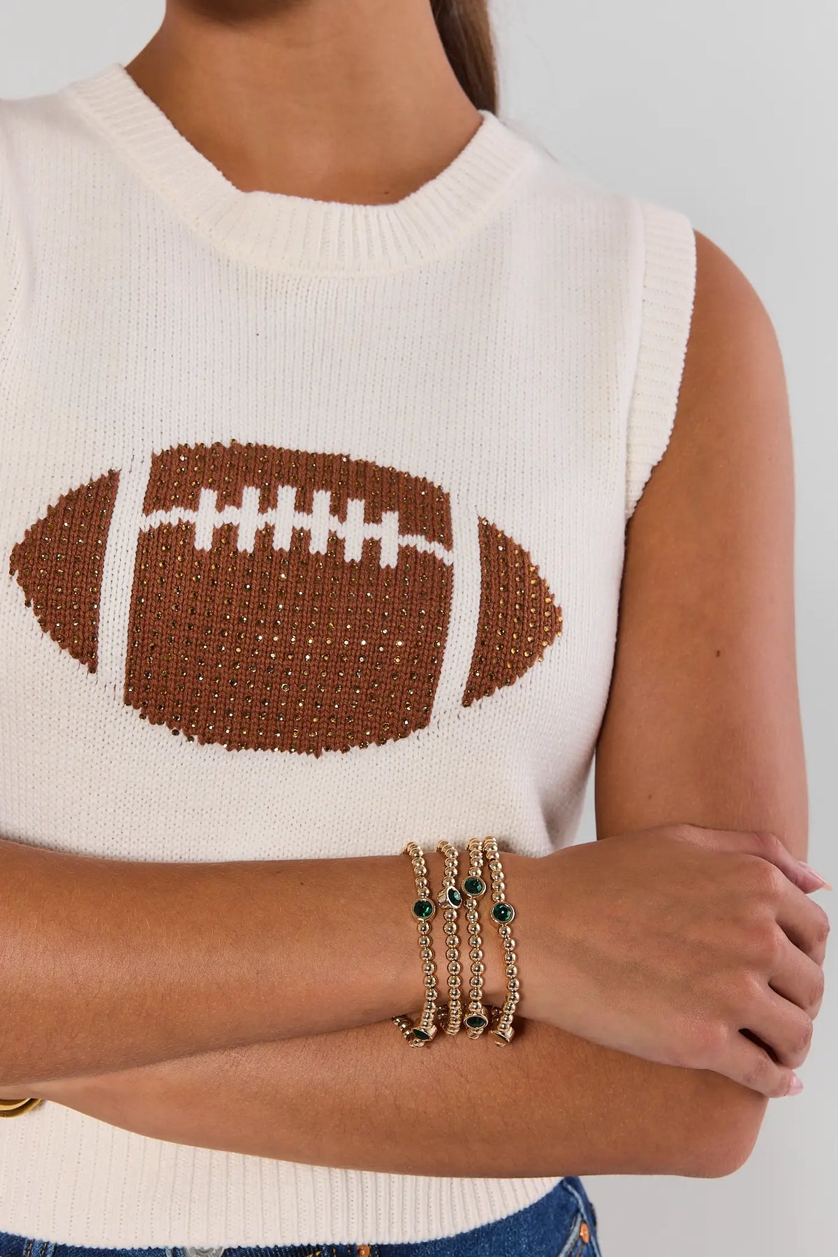 Woman wearing Gold Beaded Green Rhinestone Bracelets stacked for game day - On Model | Avara