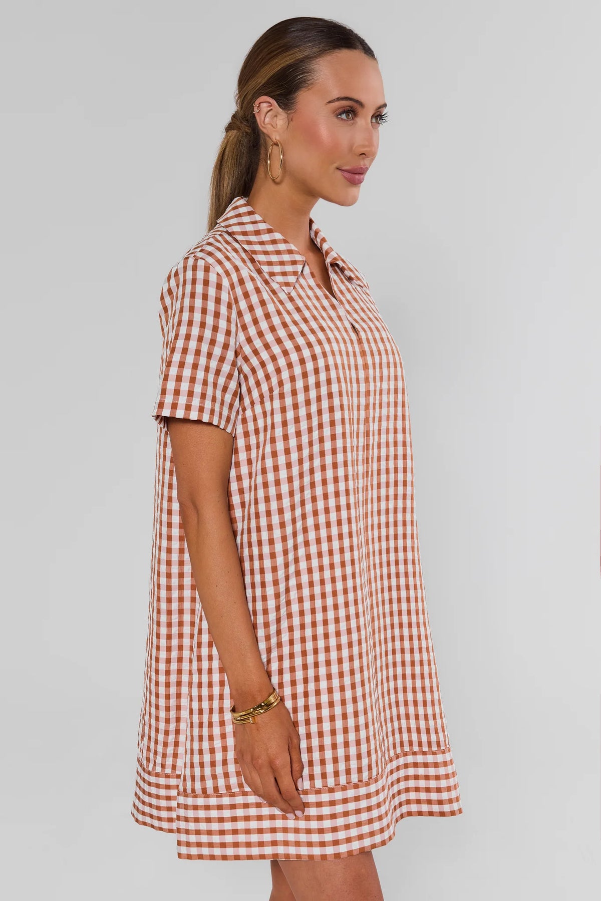 Tia Rust Gingham Collared Short Dress - Side Profile, A-line silhouette with contrast hem band | Avara