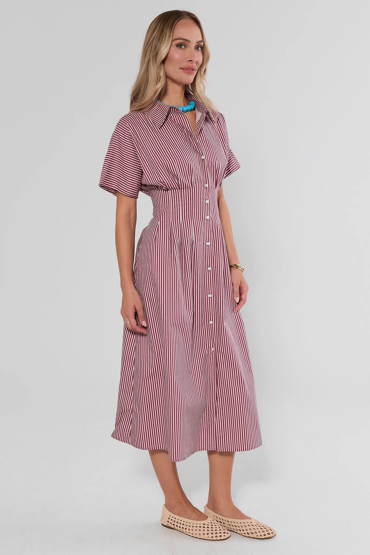 Olivia Red Striped Button Up Maxi Dress, side profile view showing A-line midi length and short sleeves | Avara