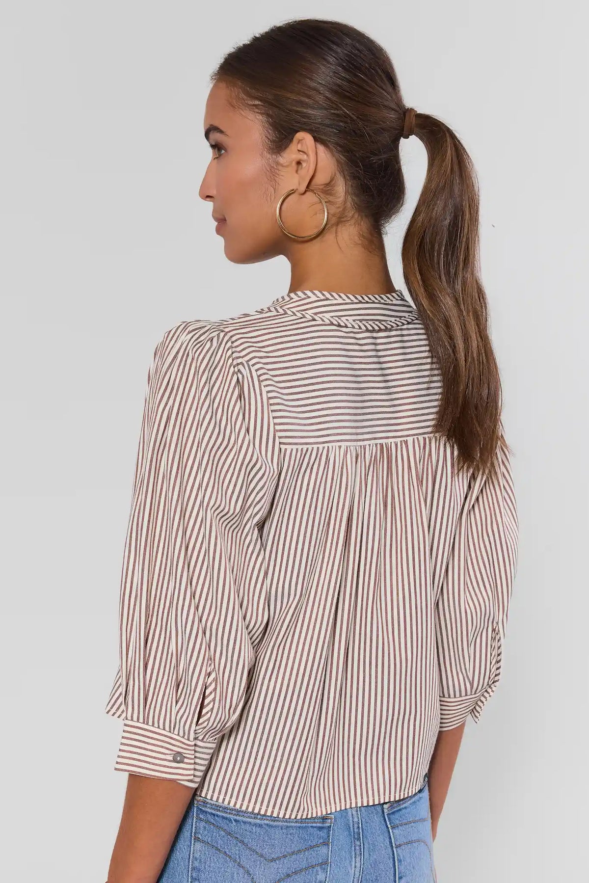 Thea Brown Striped Puff Sleeve Top showing gathered back detail and cuffed three-quarter sleeves - Back View | Avara