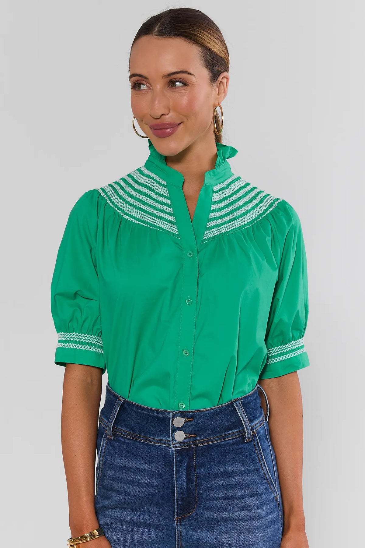 Yvonne Green and White Embroidered Top by Fate - Front View, puff sleeves, ruffle collar, paired with denim | Avara