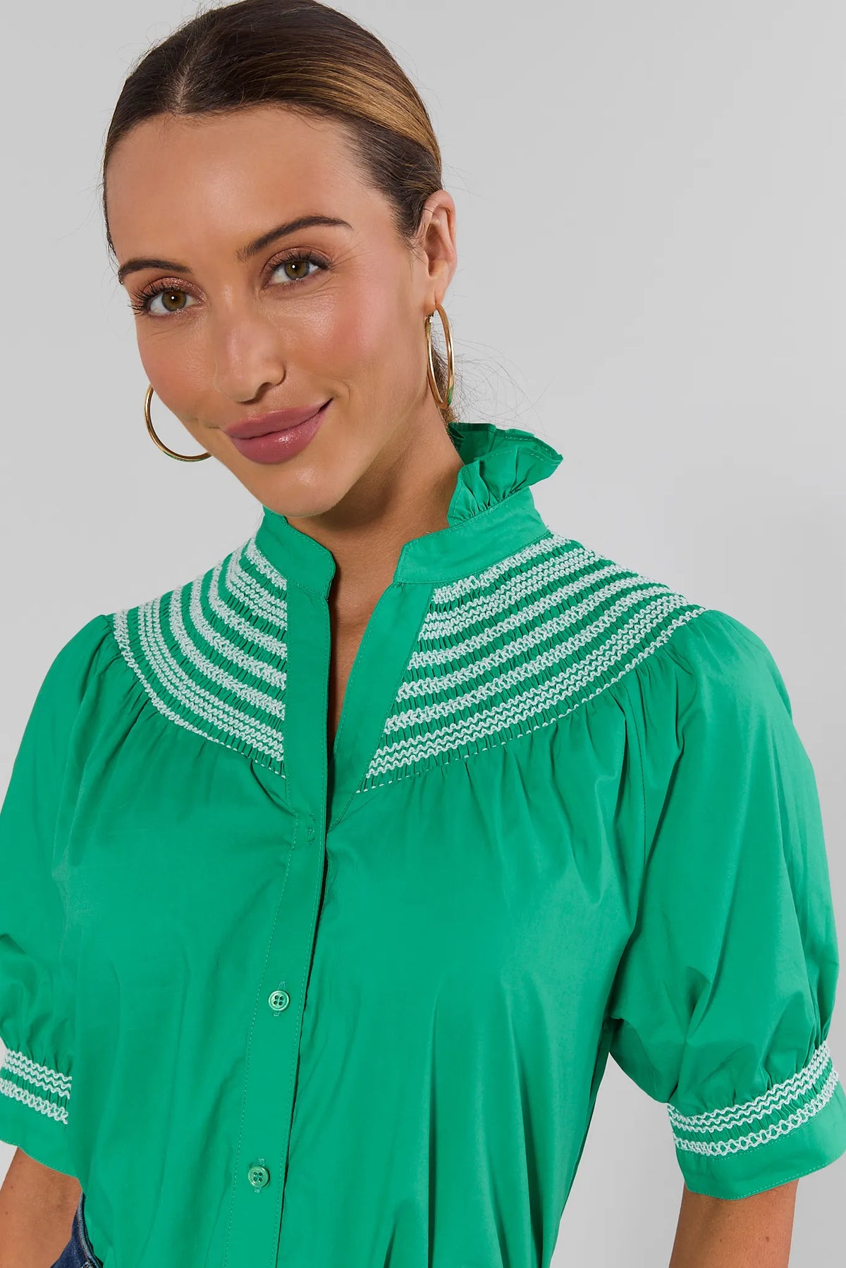 Yvonne Green Embroidered Top by Fate - Close-Up Detail of white embroidered yoke and ruffle neckline | Avara