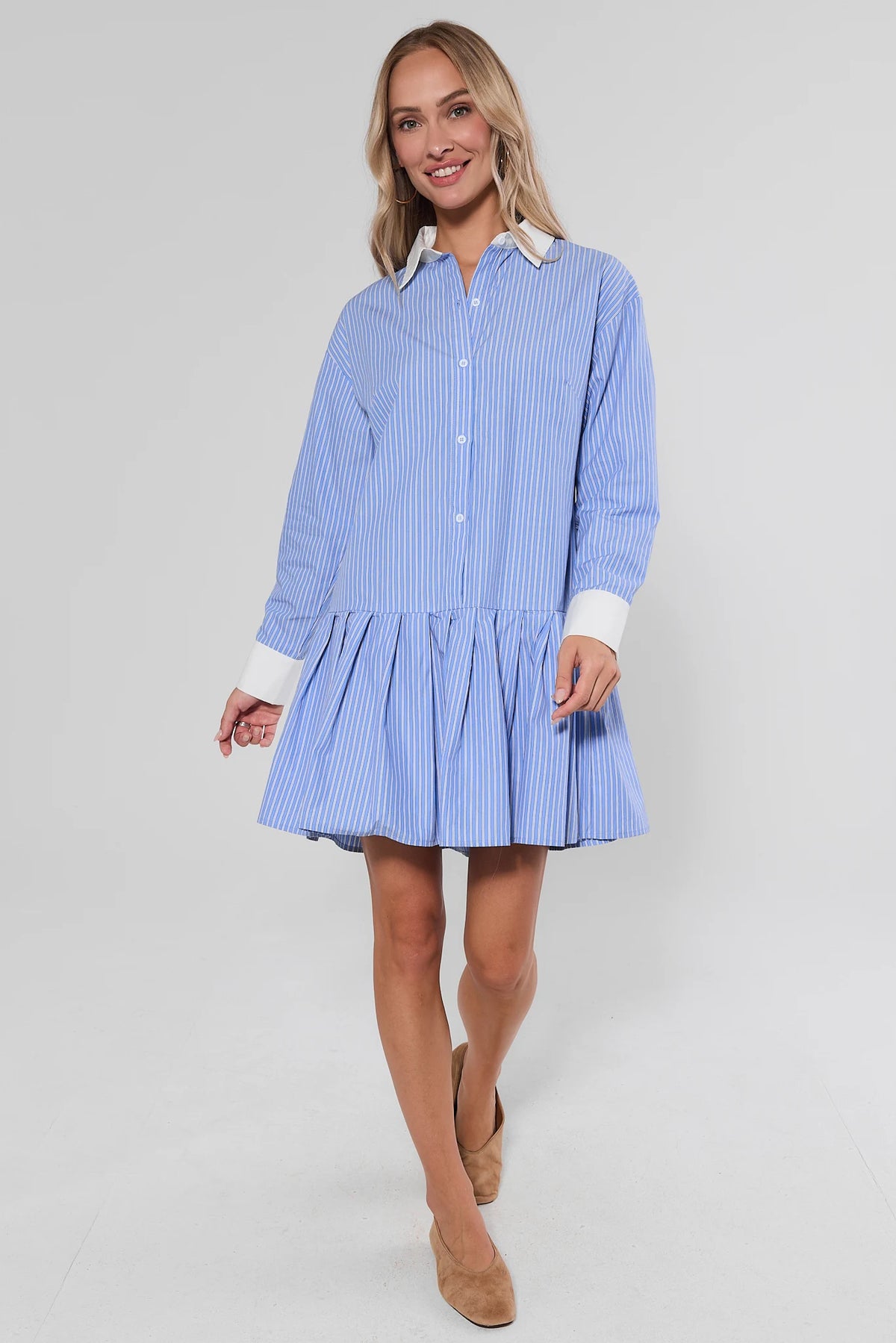 Hannah Blue Striped Collared Short Dress, back view showing drop-waist pleated skirt, white contrast collar and cuffs, long sleeves | Avara