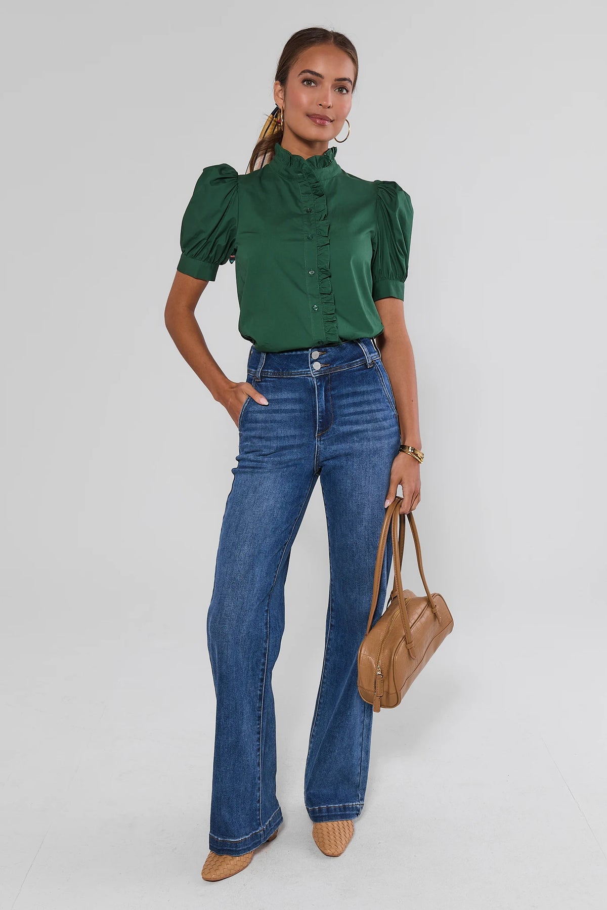 Green Ruffle Detail Button Up Top styled with flare jeans and tan bag - Full Length View | Avara