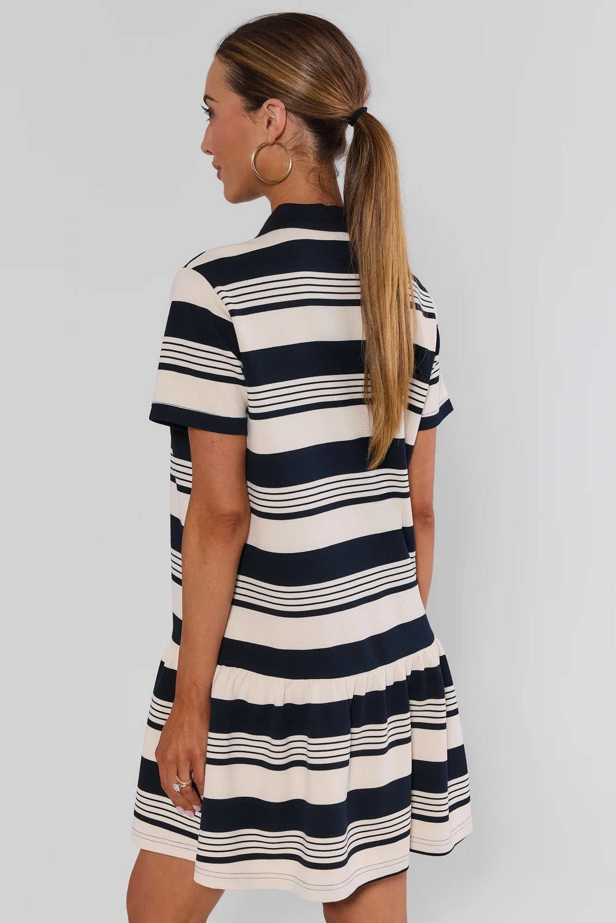 Navy Stripe Collared Short Dress back view showing short sleeves and tiered ruffle hem, women's striped dress | Avara
