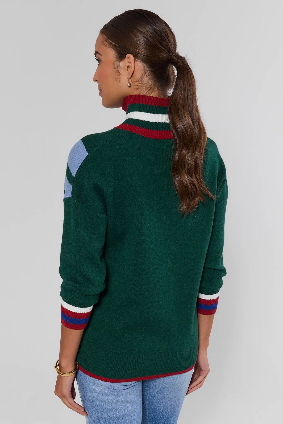 Collin Green Knit Zip Up Sweater showing striped collar and blue shoulder colorblock detail, paired with jeans - Back View | Avara