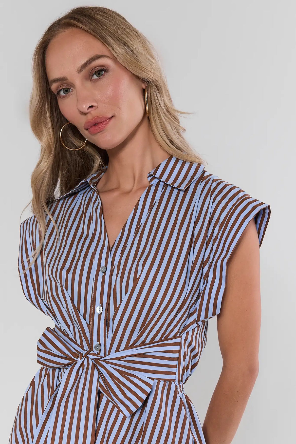 Oakley Brown & Blue Striped Midi Dress, collared neckline & tie waist, close-up detail on model | Avara