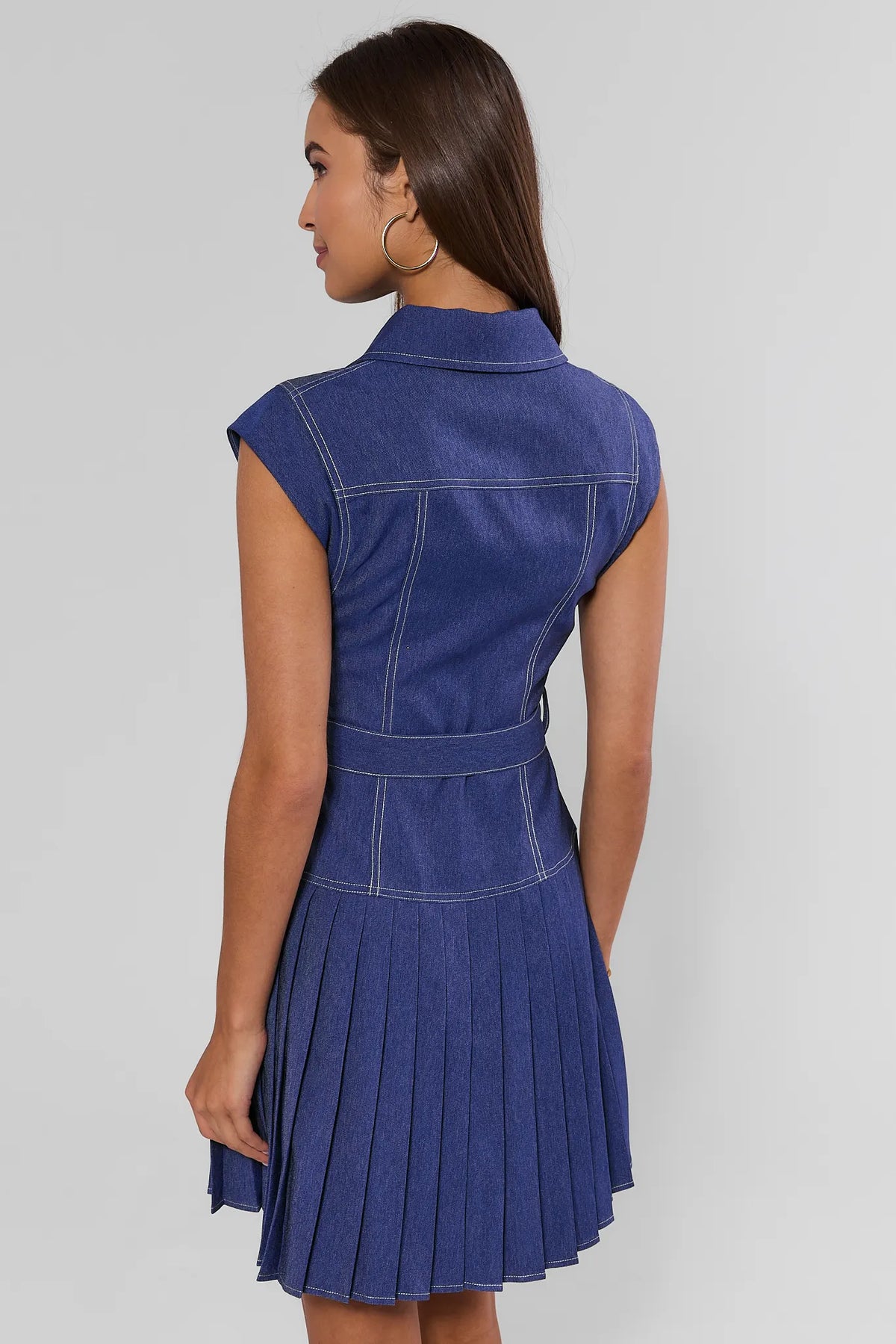 Edie Denim Pleated Button Up Dress showing contrast stitching and pleated skirt detail - Back View | Avara