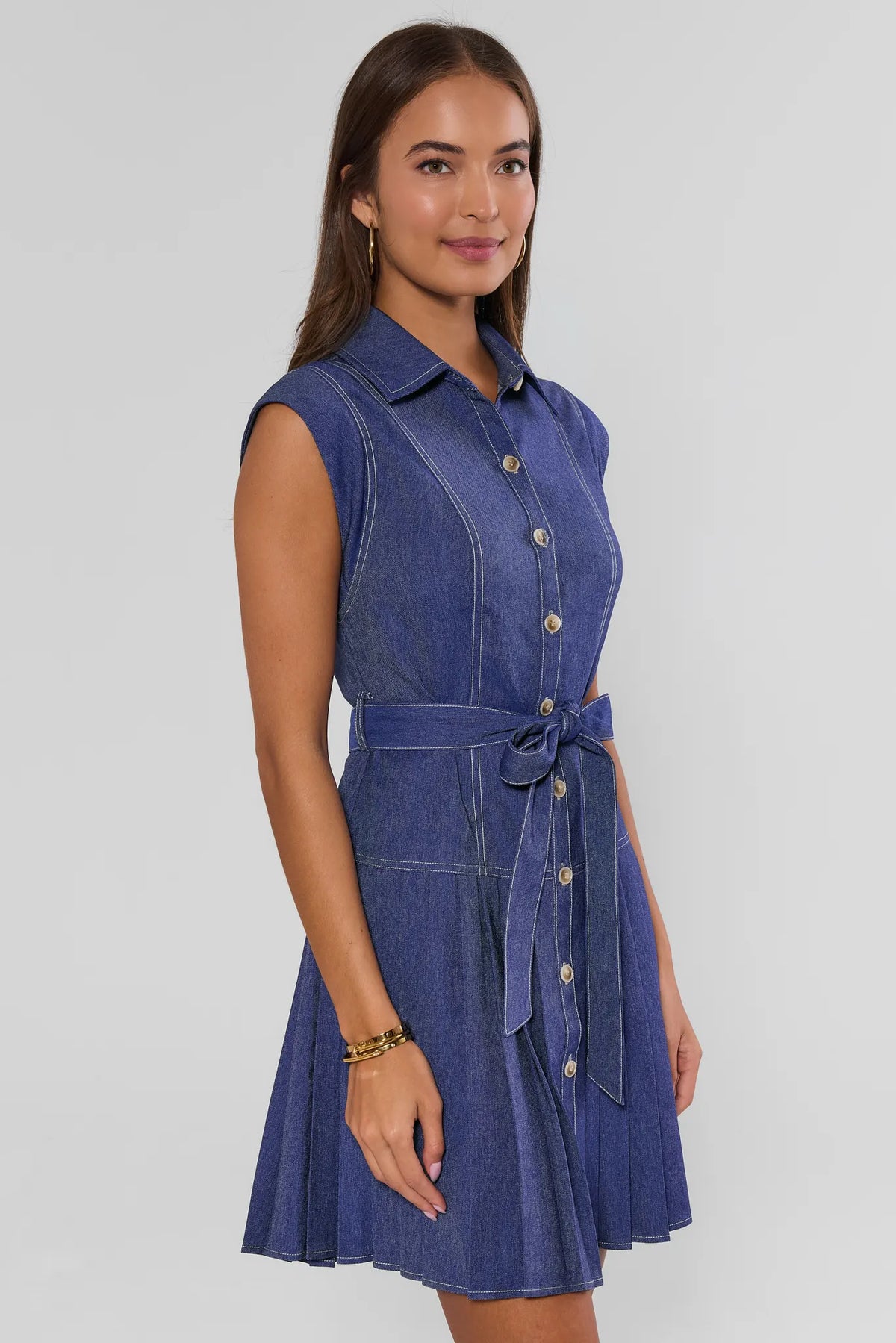 Edie Blue Denim Pleated Button Up Dress with tie waist and pleated skirt - Side View | Avara