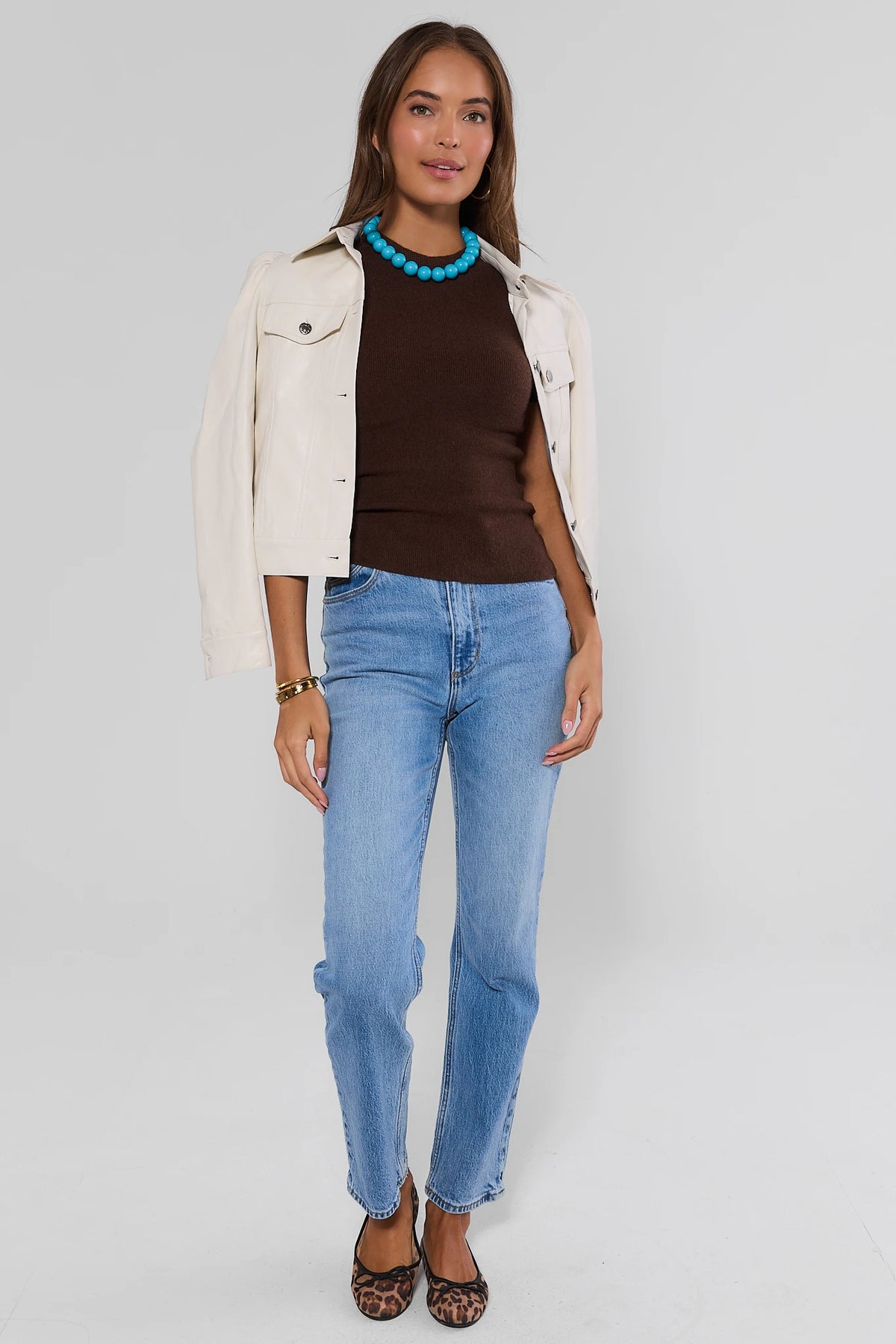 Brown Ribbed Top Styled with Cream Jacket and Wide Leg Jeans - Full Look | Avara