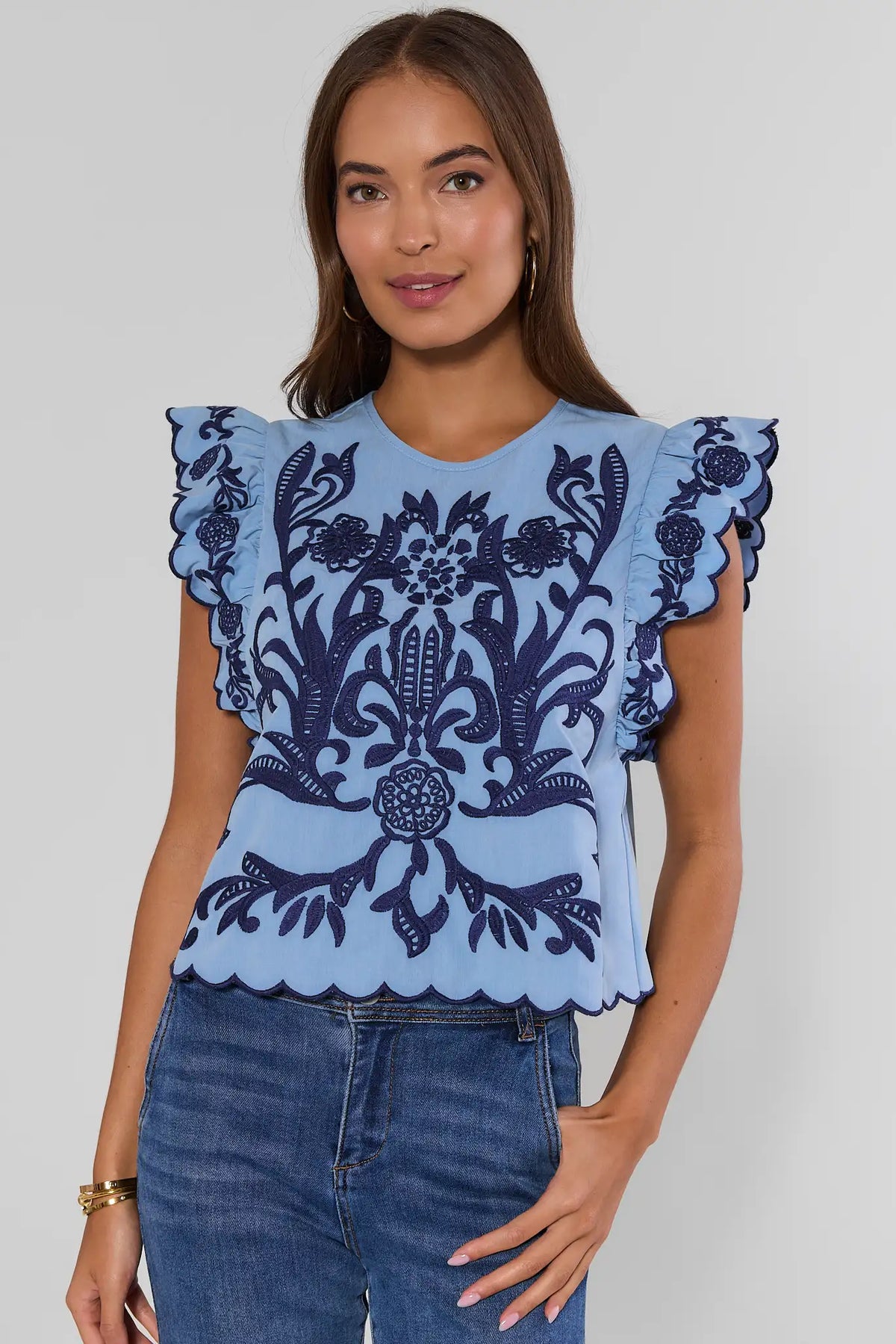 Light Blue Navy Embroidered Ruffle Sleeve Top - Front View On Model | Avara