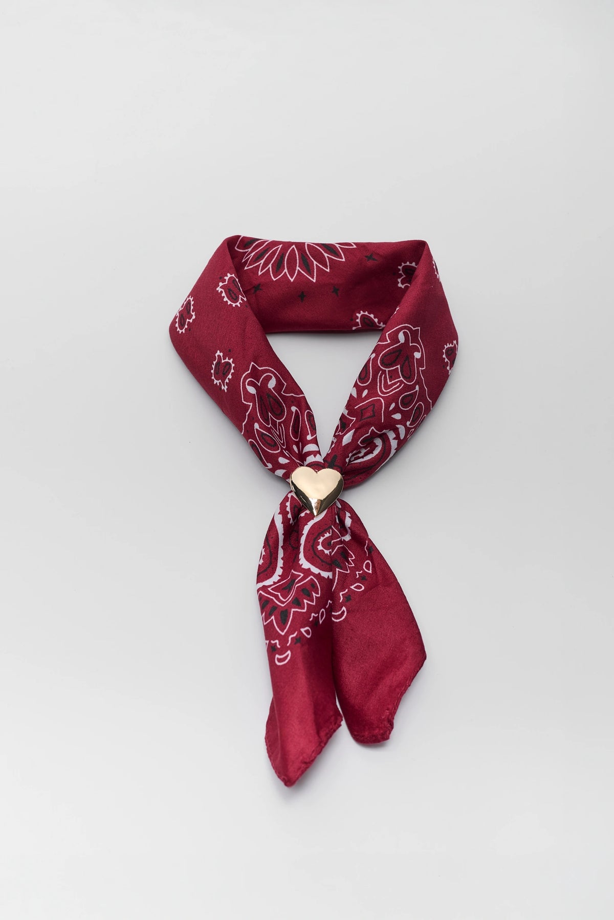Red Paisley Bandana Scarf with Gold Heart Detail - Flat Lay | Avara