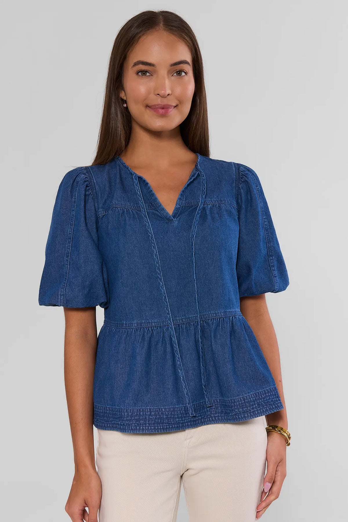 Blue Denim Split Neck Peplum Top - Front View On Model | Avara