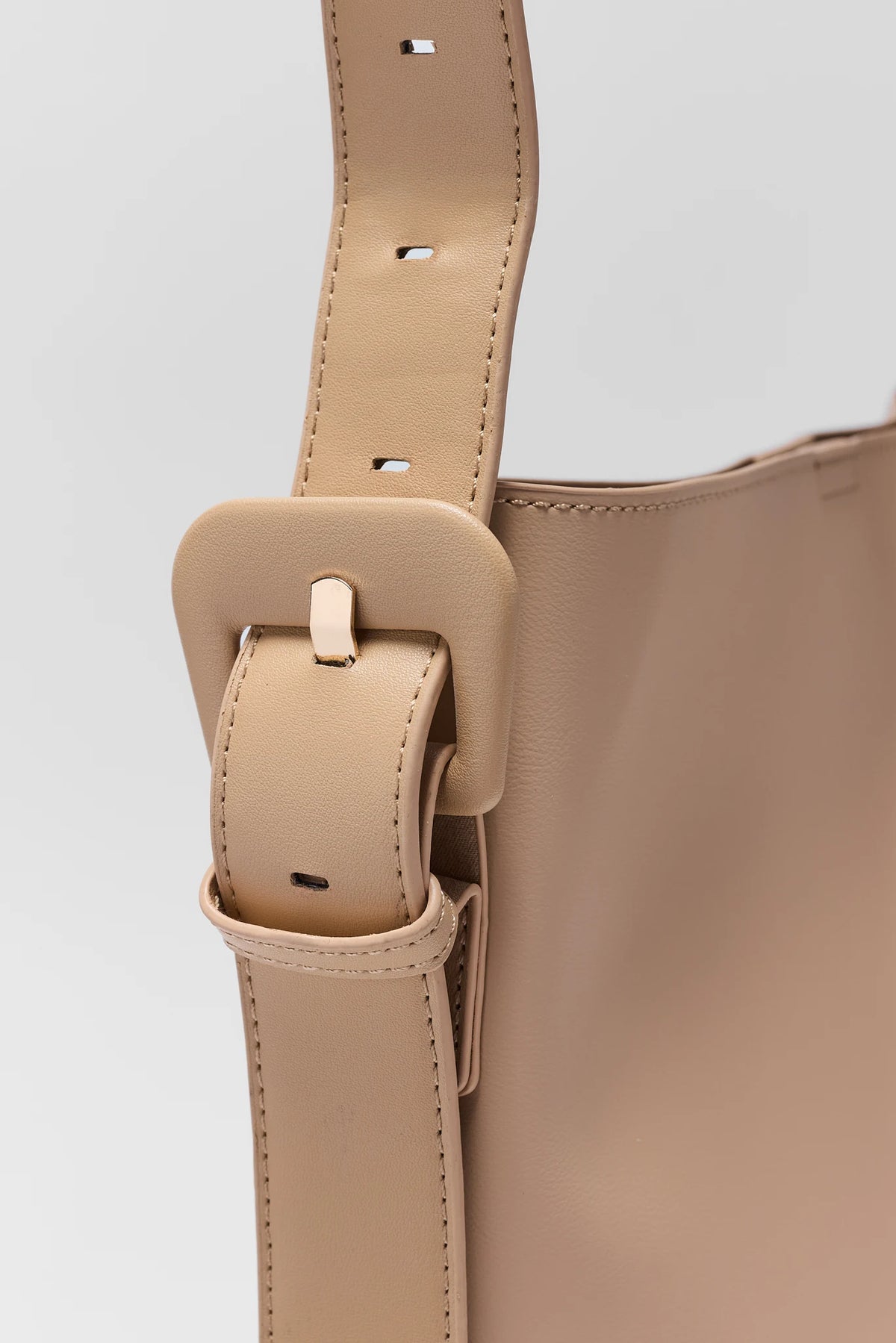 Tan Faux Leather Bucket Bag - Gold Buckle Strap Hardware Detail | Avara