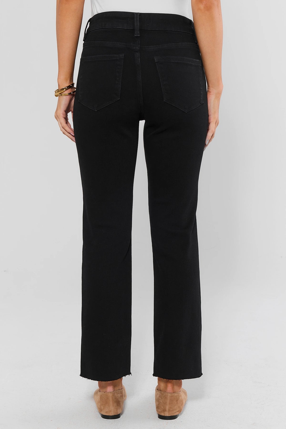 Becca Black Kick Flare Cropped Jeans showing back pockets and raw frayed hem - Back View On Model | Avara