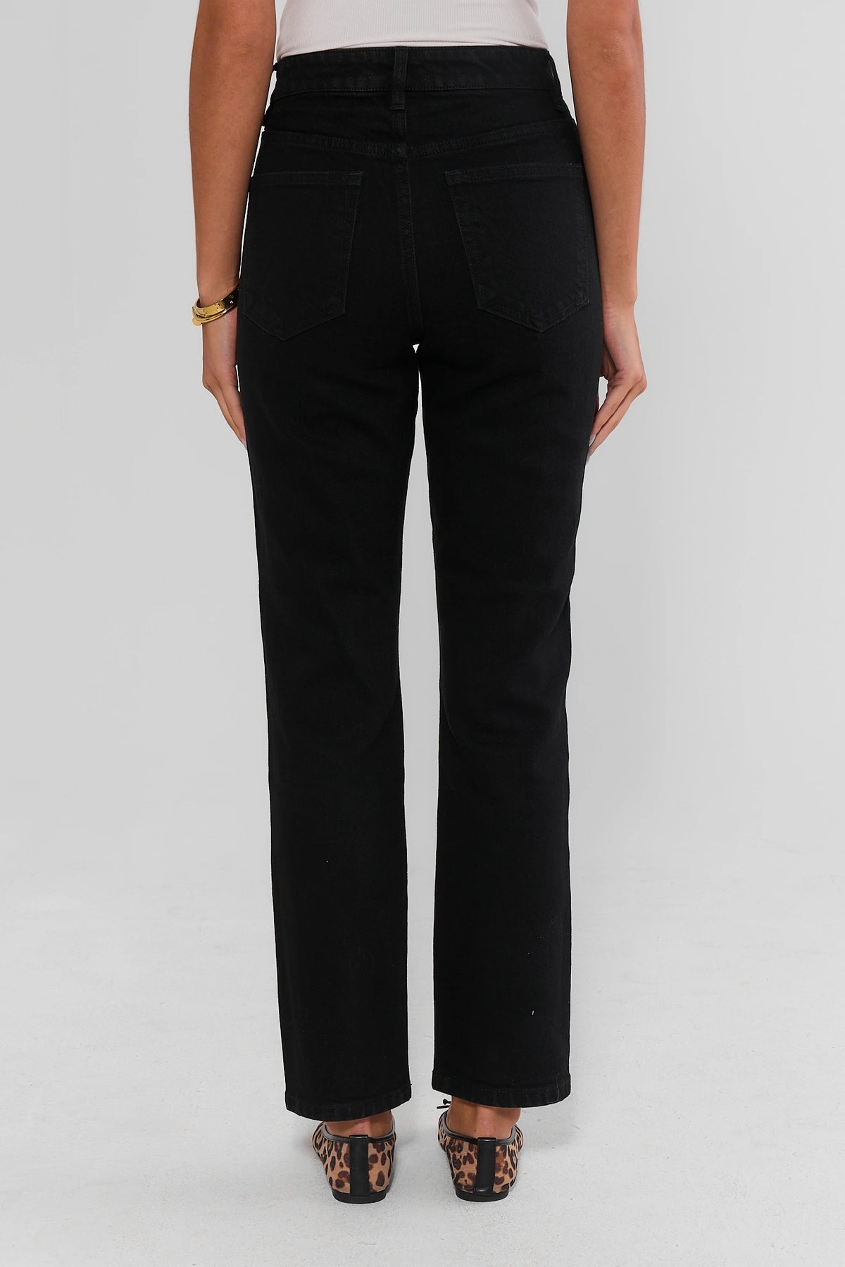 Black Denim Straight Leg Jeans - Back View Showing Rear Pockets On Model | Avara