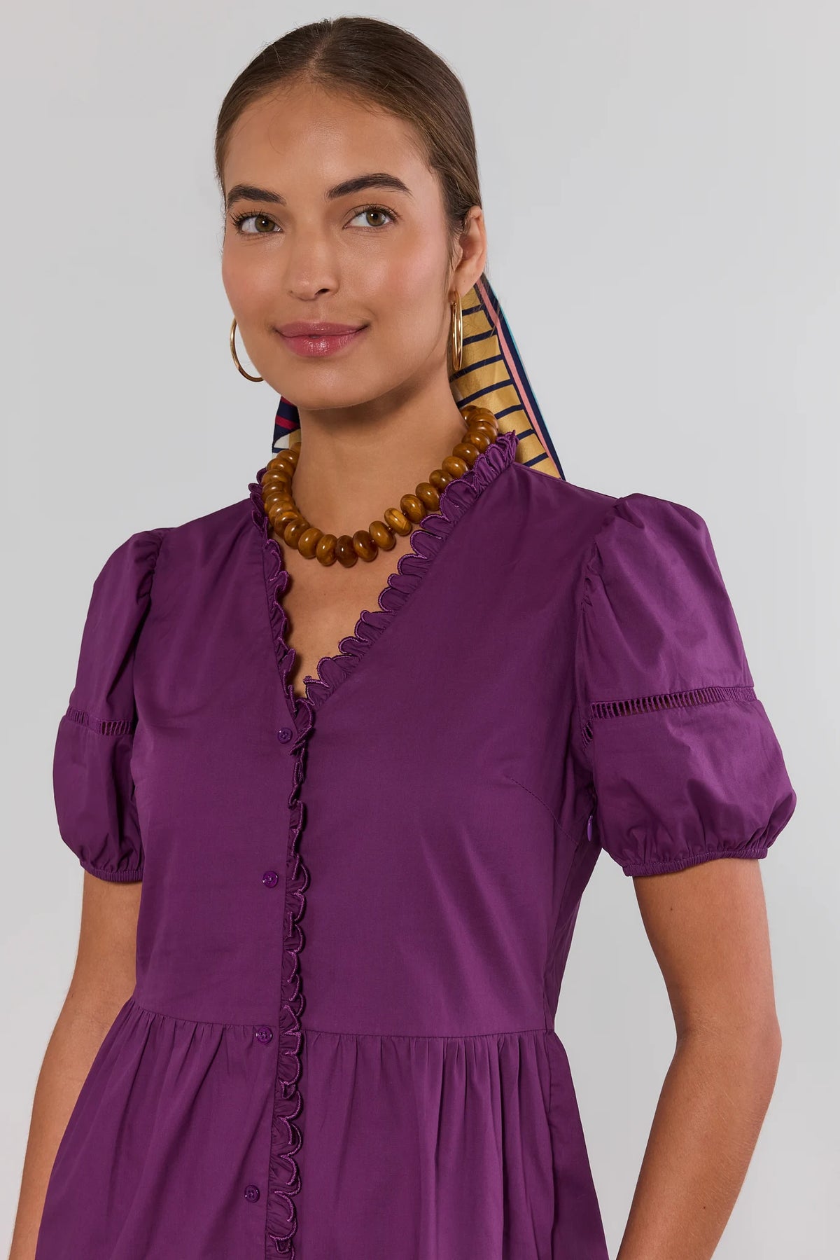 Purple Scalloped Hem Dress Close-Up Ruffle Neckline Detail | Avara