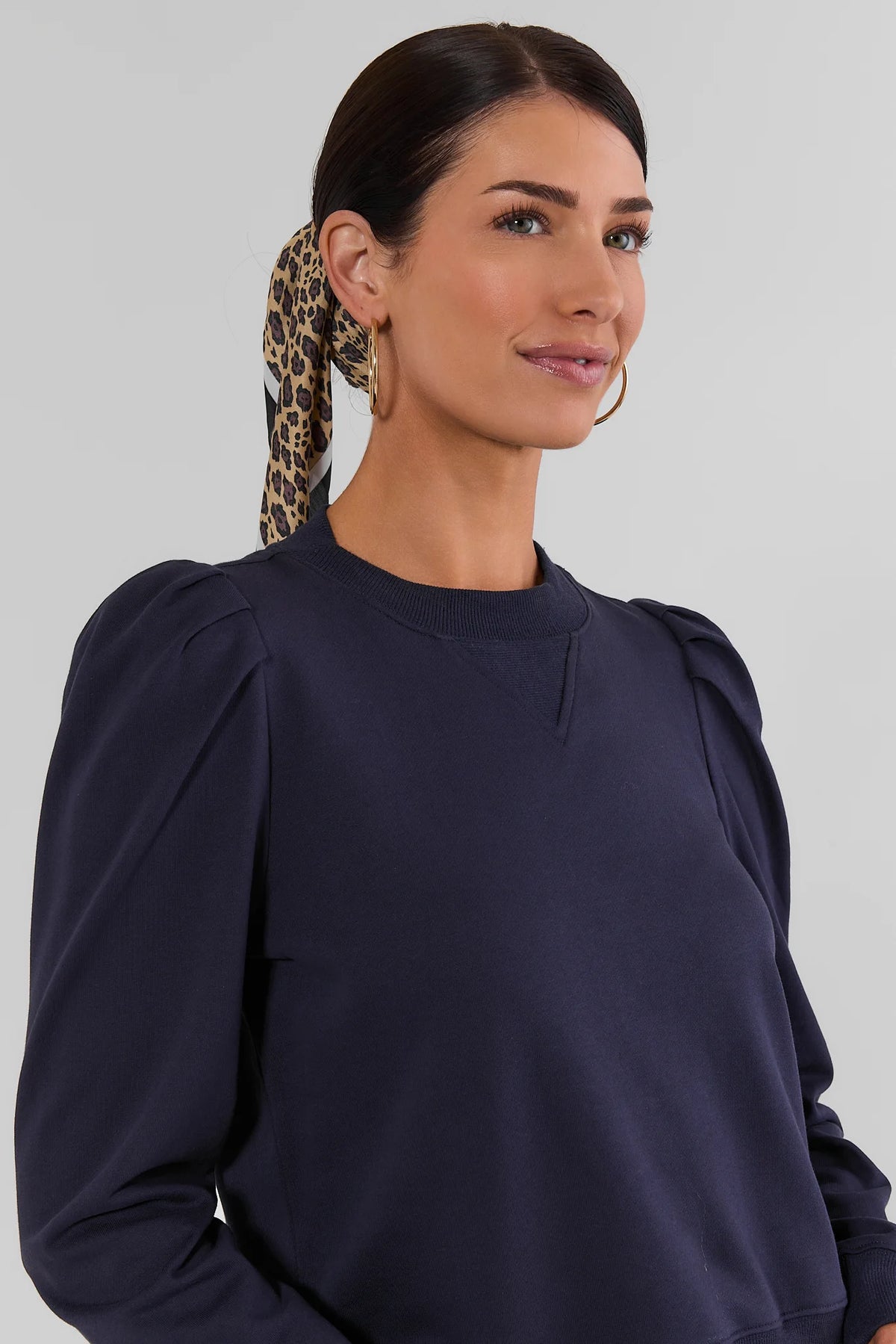 Navy Knit Crewneck Puff Sleeve Top - Close-Up Neckline Detail | Avara