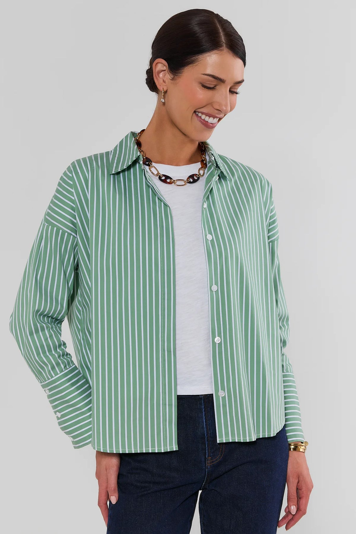 Green Striped Button-Up Top - Front View, Open Over White Tee with Dark Denim | Avara