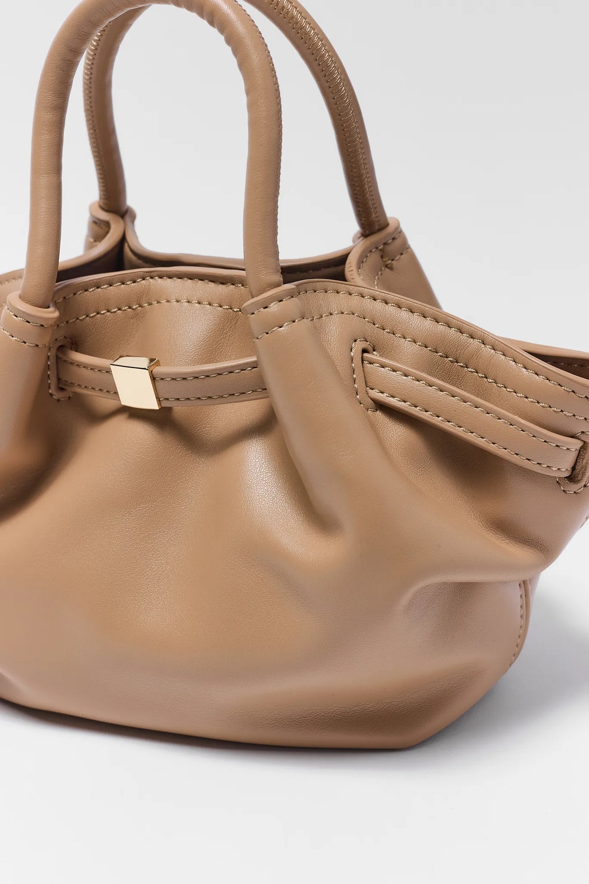 Tan Faux Leather Slouchy Crossbody Bag Gold Hardware Detail - Close Up | Avara