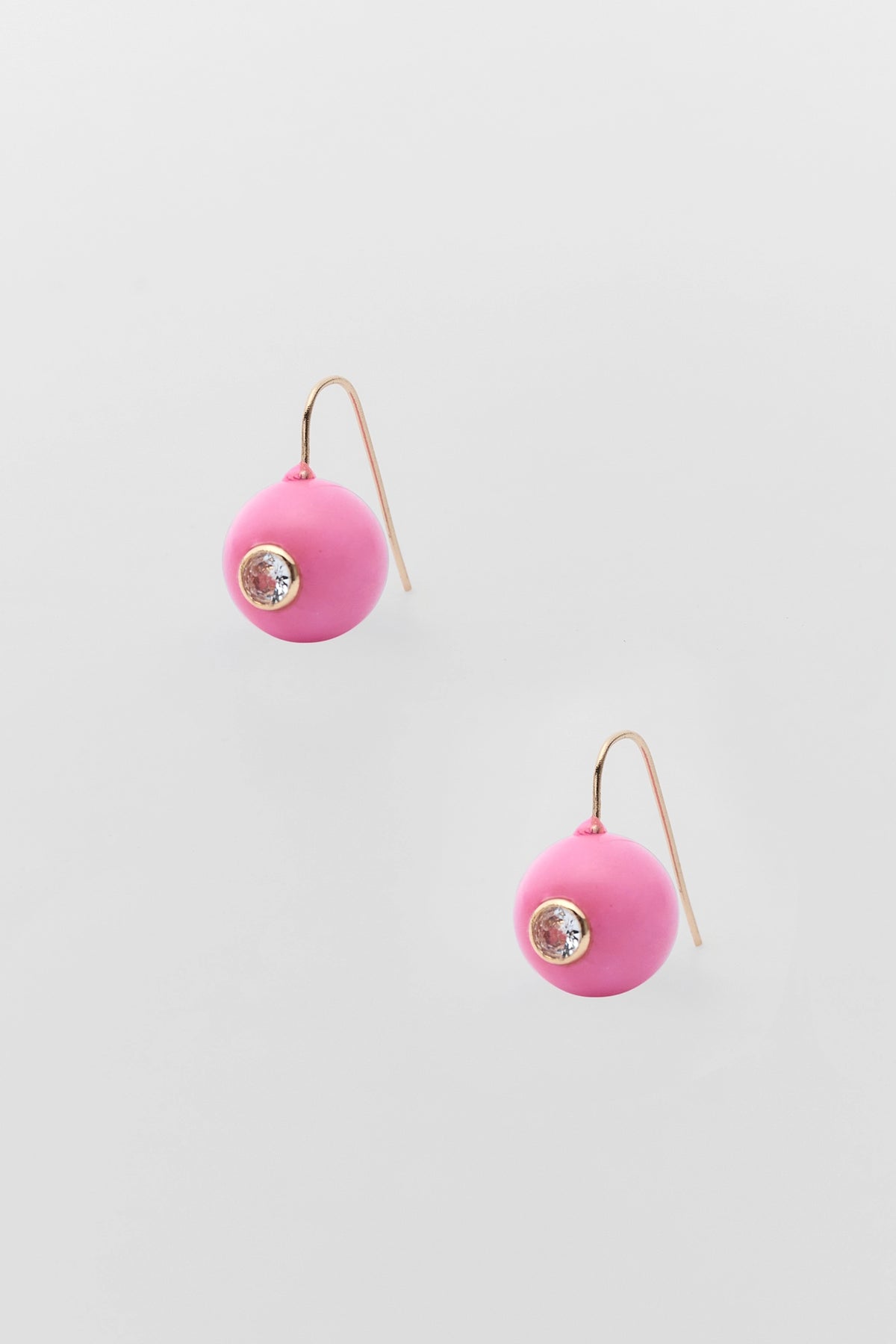 Pink Acrylic Circle Drop Earrings with Rhinestone Center - Product Flat Lay | Avara