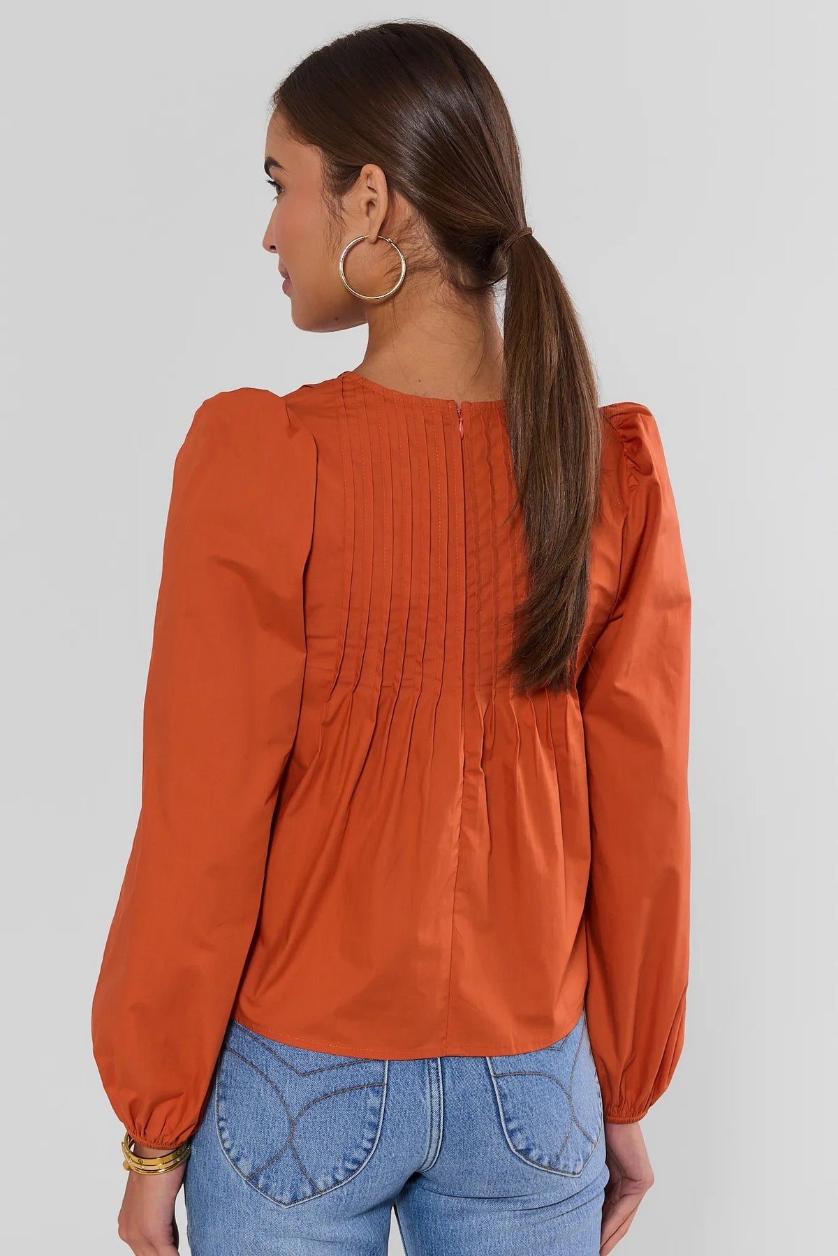 Orange Cotton Pleated Top - Back View with Zip Detail On Model | Avara